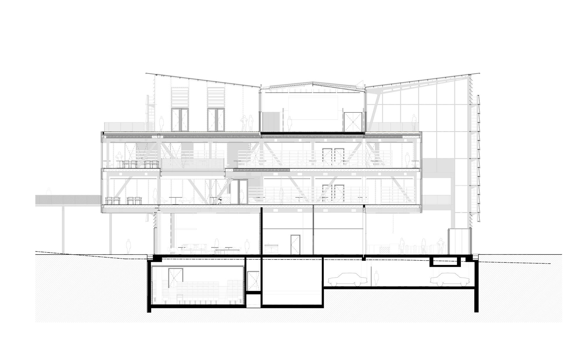 Section drawing showing multi-level interior spaces with stairs, thick walls and basement rooms below grade