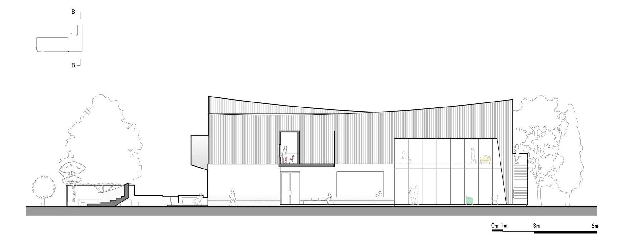 Section drawing showing two-story building with curved roof and adjacent trees