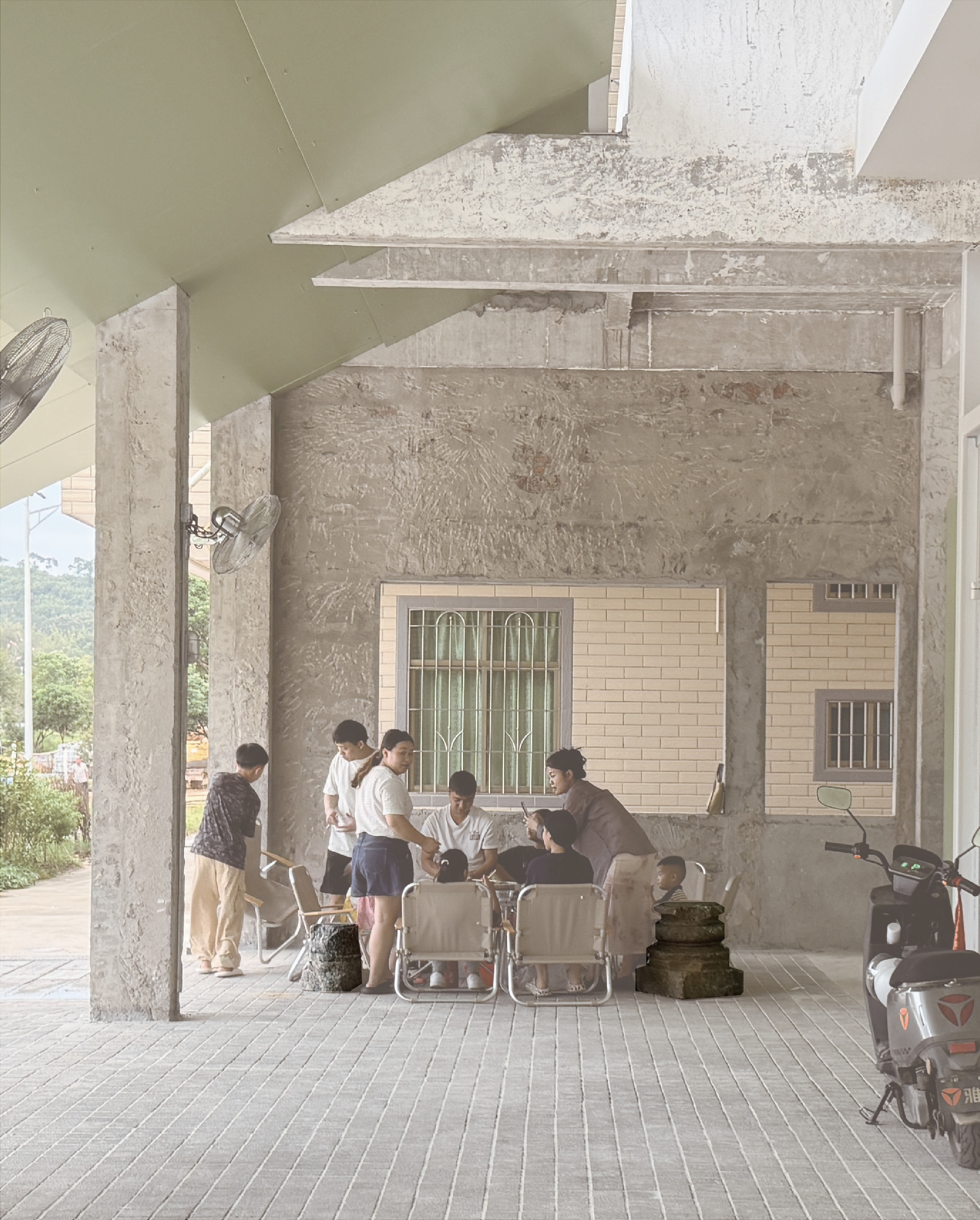 Covered outdoor porch with concrete columns where visitors gather around folding chairs in afternoon light
