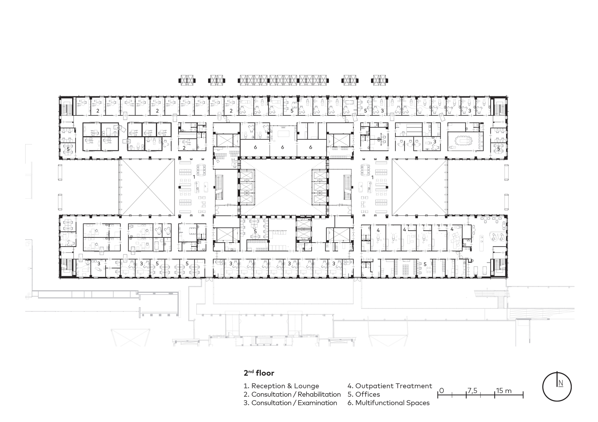 Second floor plan showing a rectangular layout with central courtyards and perimeter rooms
