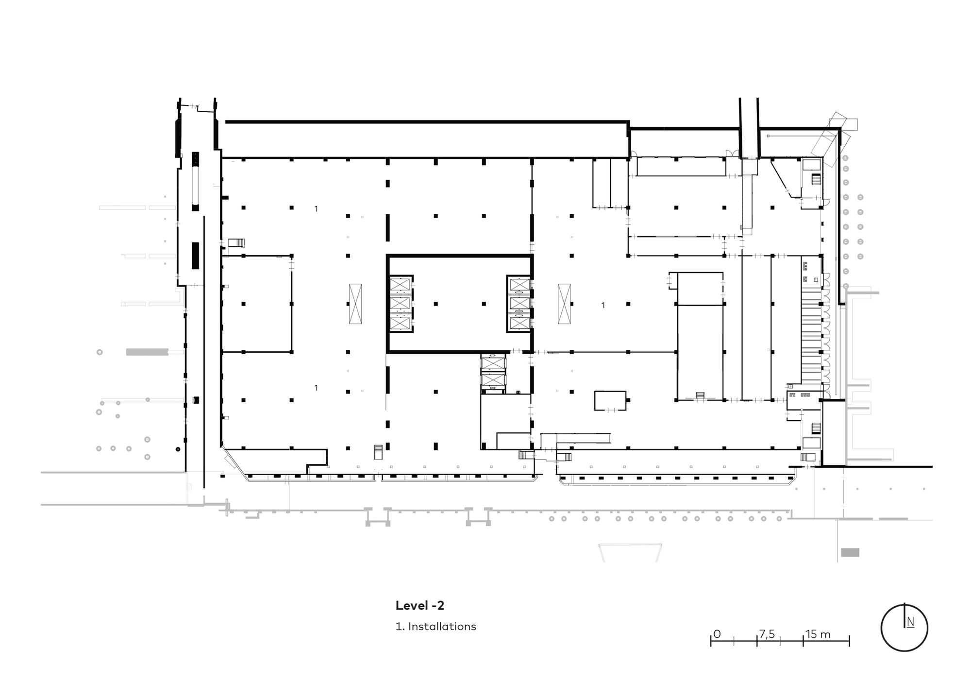 Level two floor plan drawing showing installations area with large open space and perimeter service zones