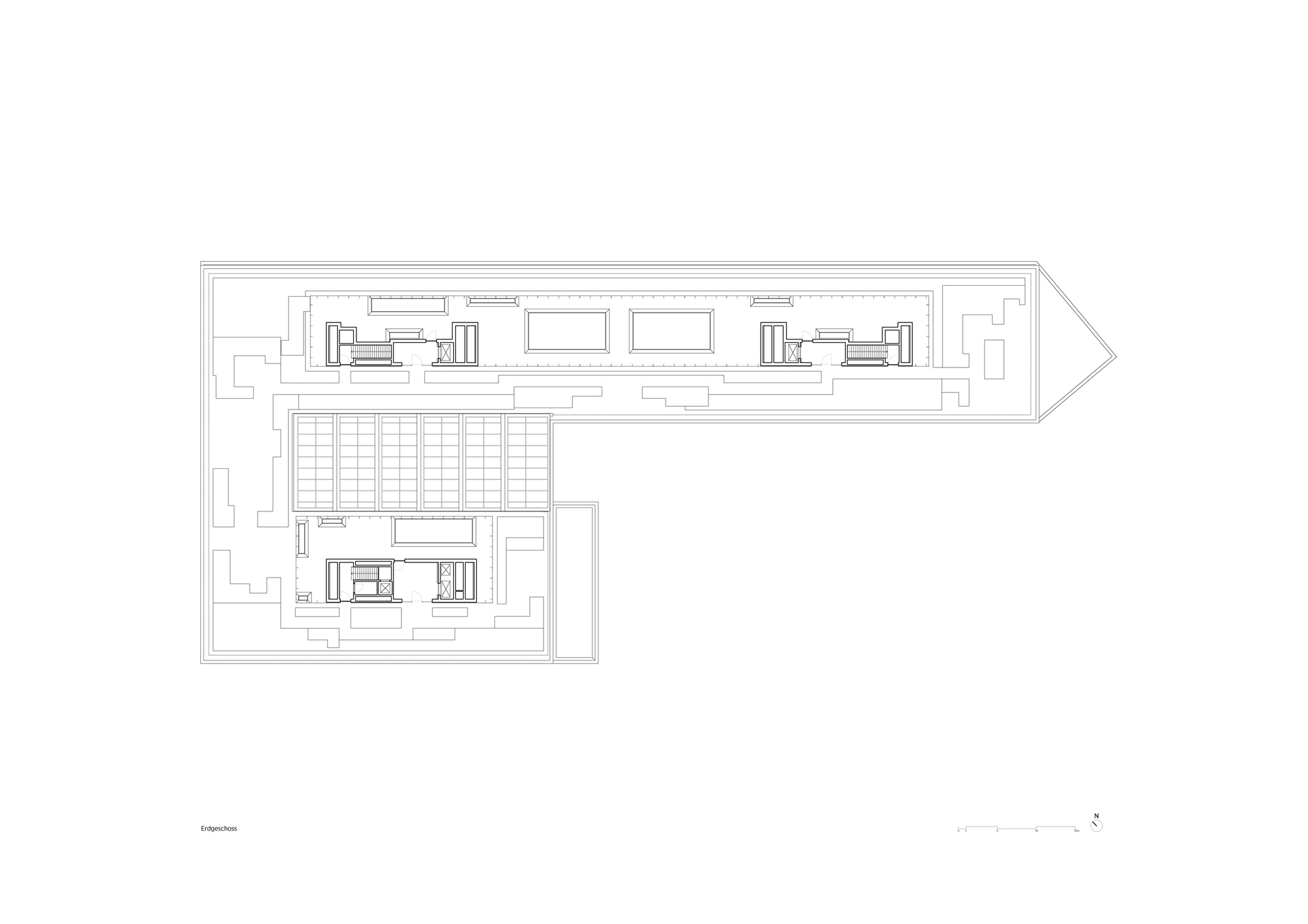 Basement floor plan drawing showing parking layout and service cores in angled building volume