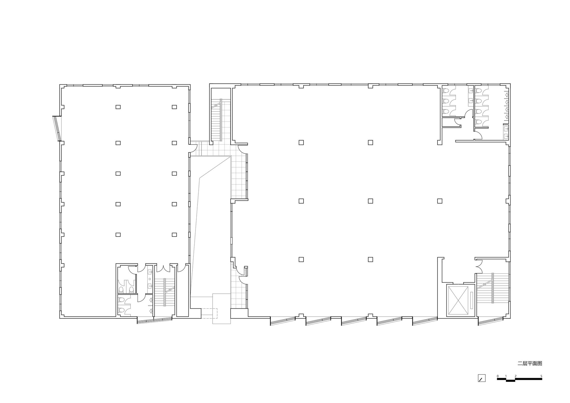 Second floor plan drawing showing the two volumes with staircases and circulation cores at the corners