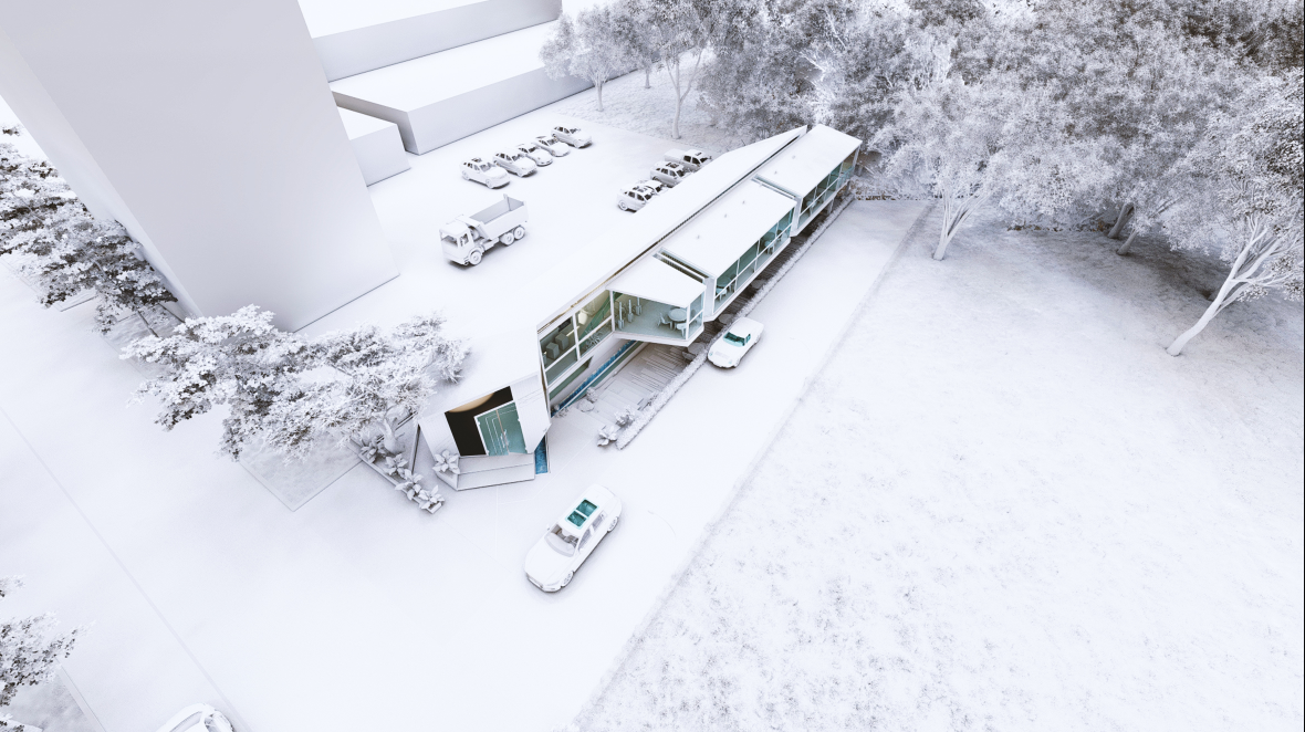 Aerial view showcasing the café's elongated form integrated seamlessly with its urban landscape.