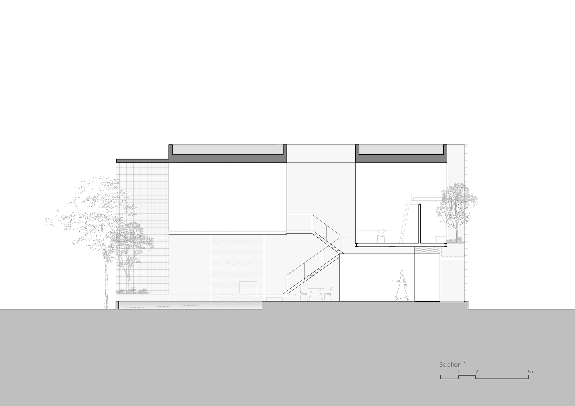 Section drawing showing a two-story interior with central staircase and flanking trees
