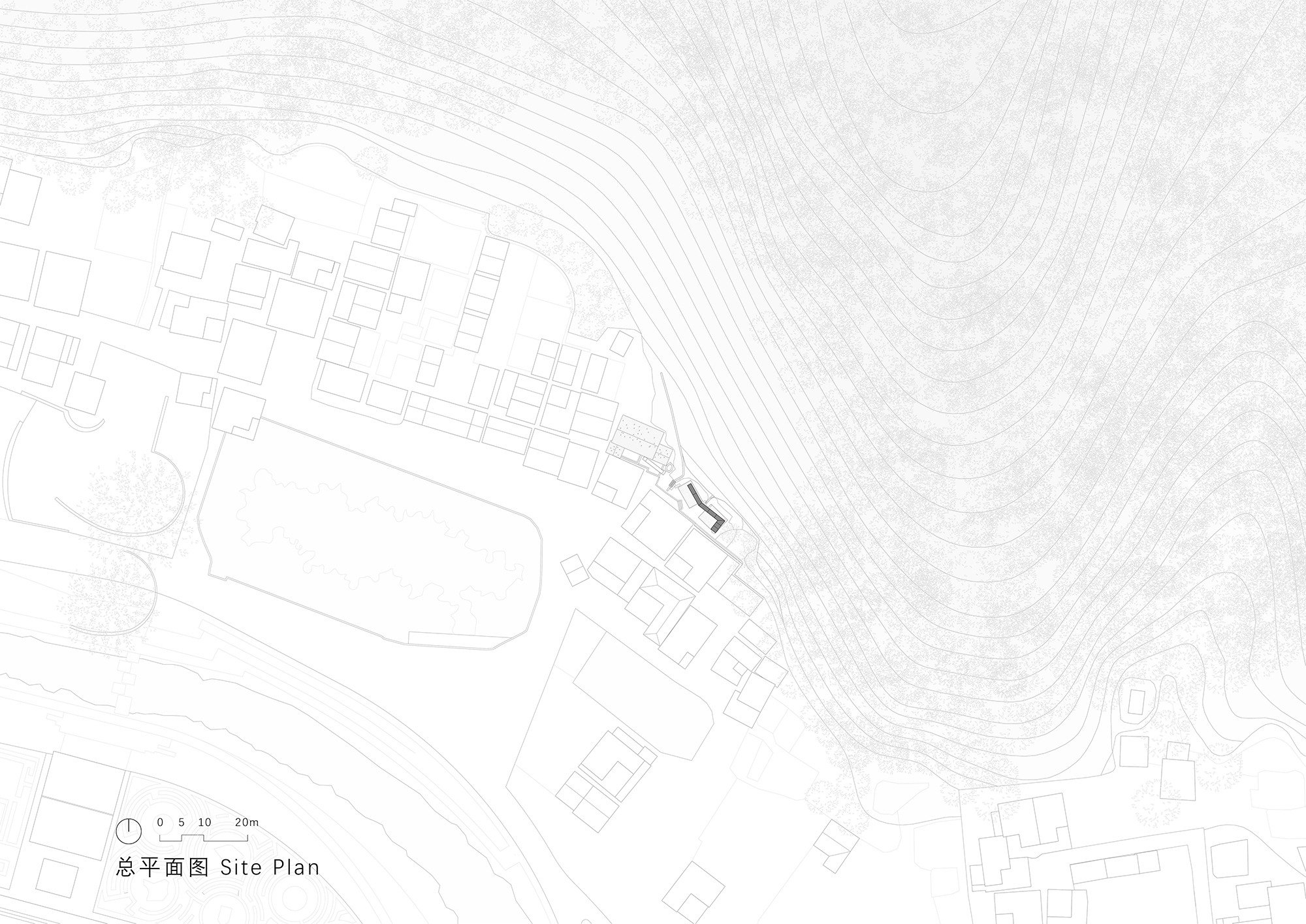 Site plan drawing showing curved structure positioned among contour lines with surrounding village fabric and topography