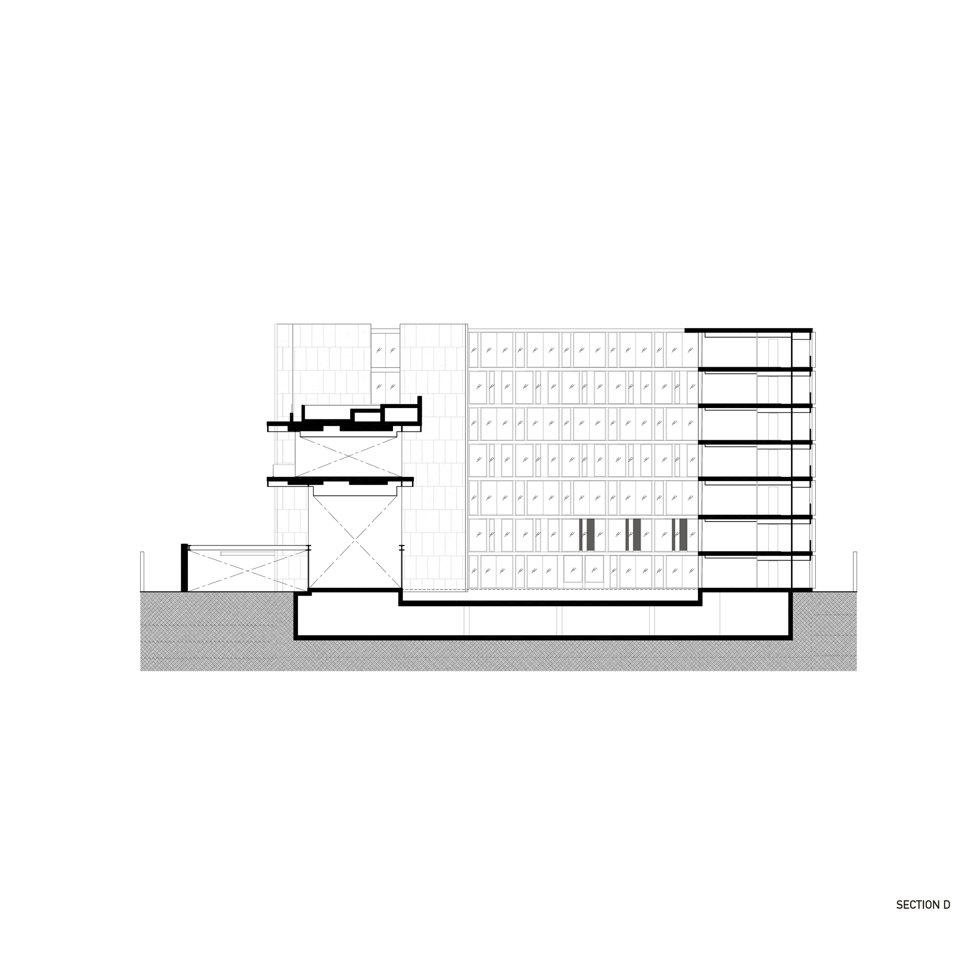 Section drawing showing volumes of varying heights with an open courtyard at lower levels