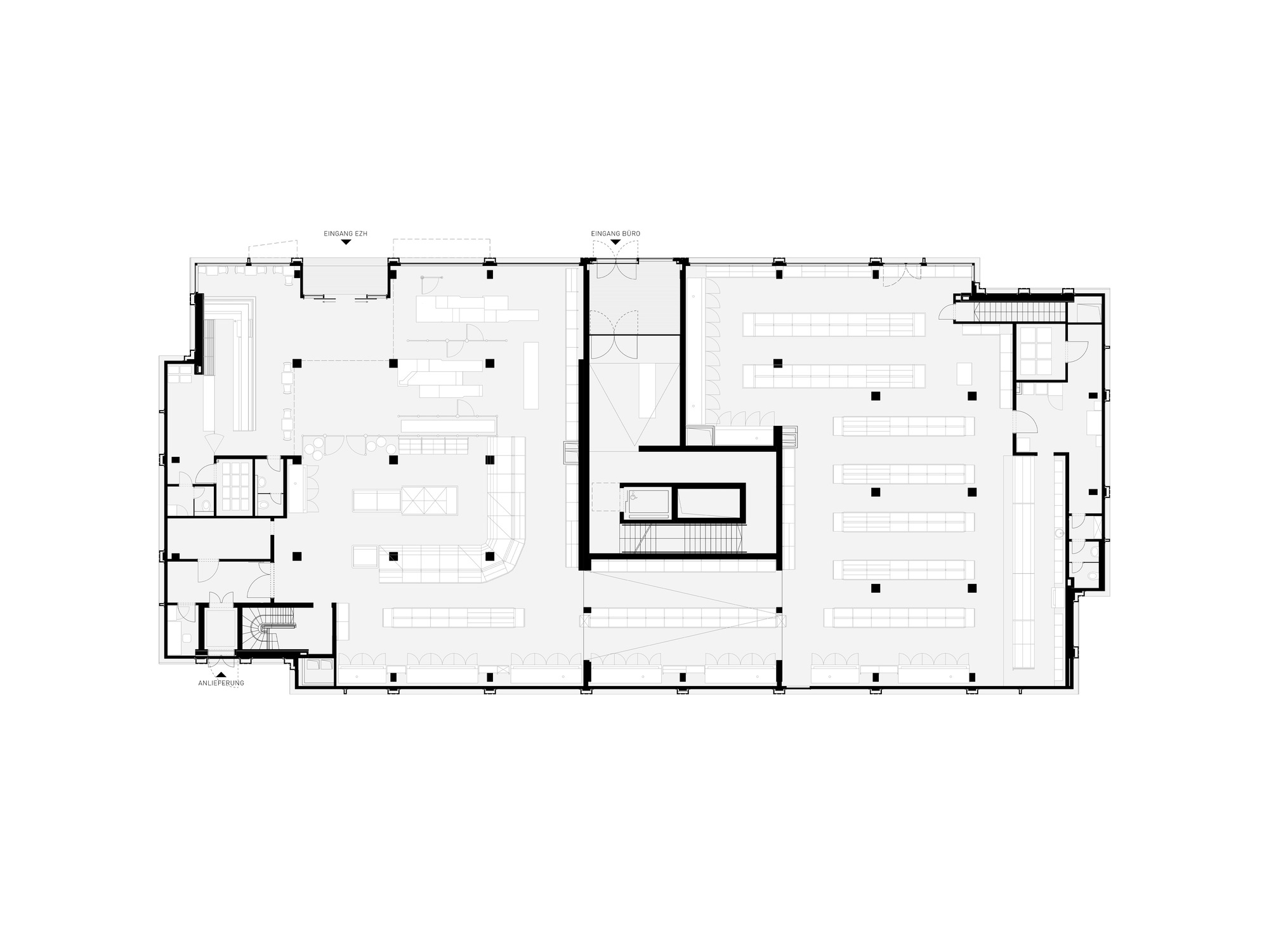 Floor plan drawing revealing large open areas flanking a central service core with support spaces