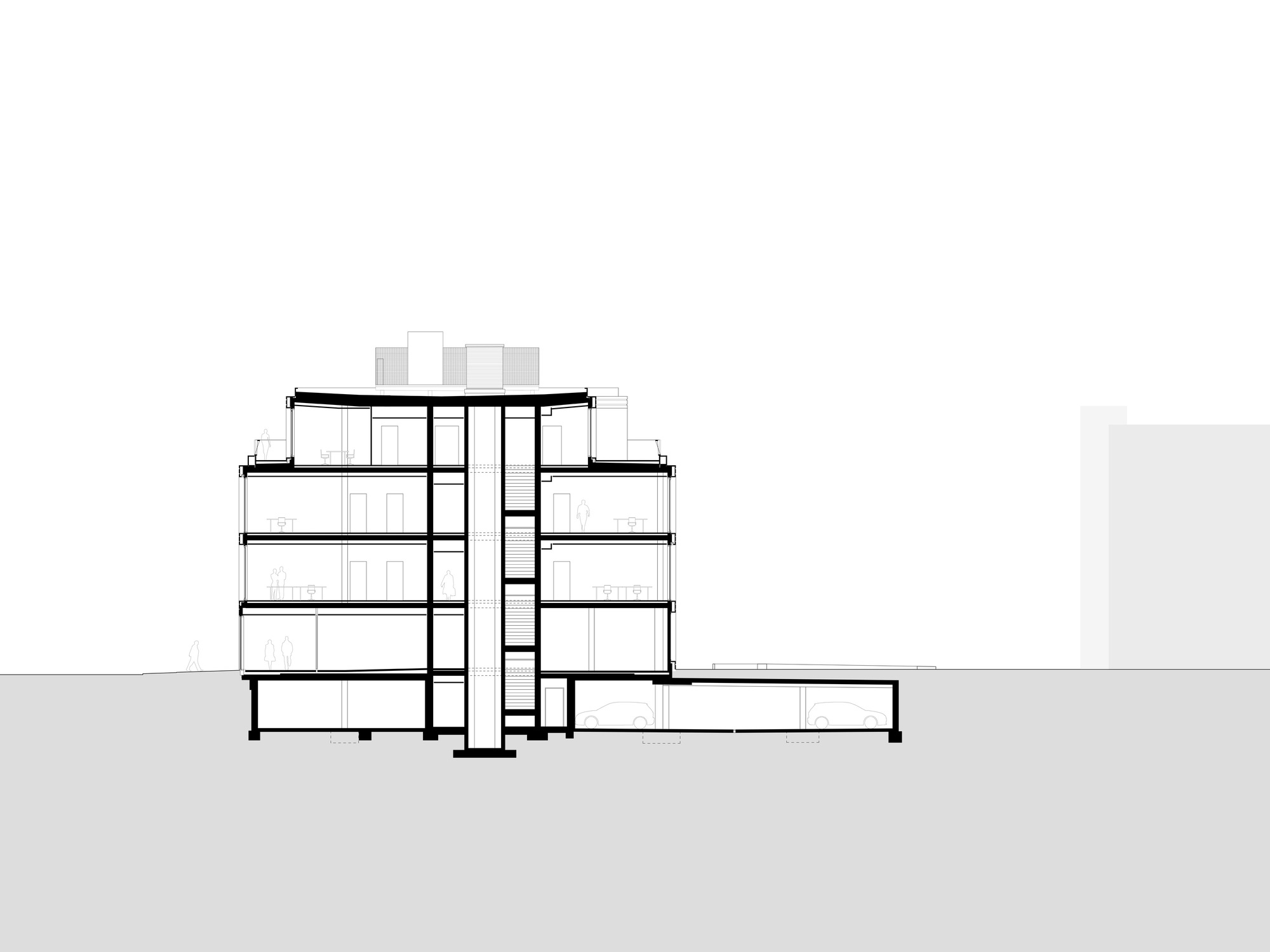 Section drawing displaying a multi-story volume with central stairwell and adjacent low-rise wing
