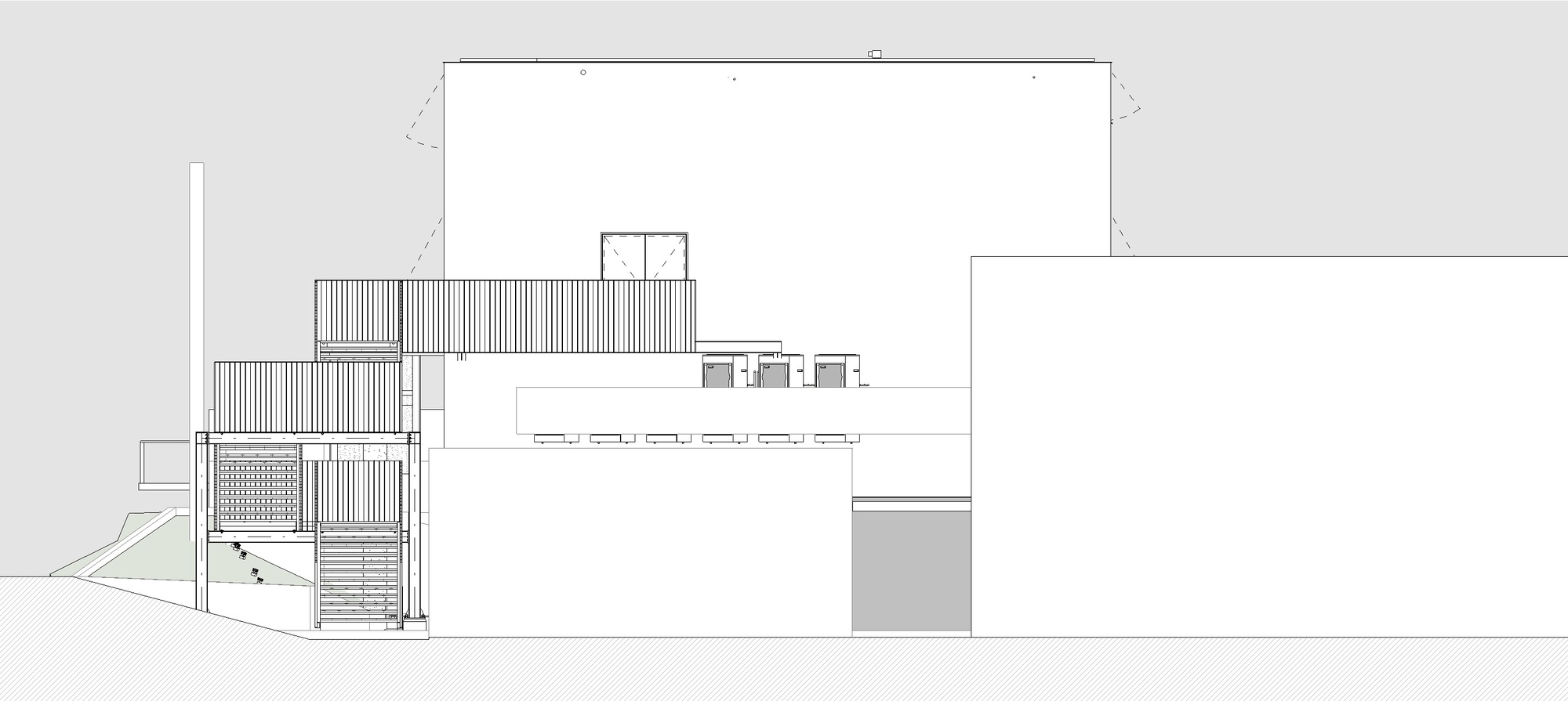 Elevation drawing featuring a vertical slatted element and horizontal roof monitors on white volumes