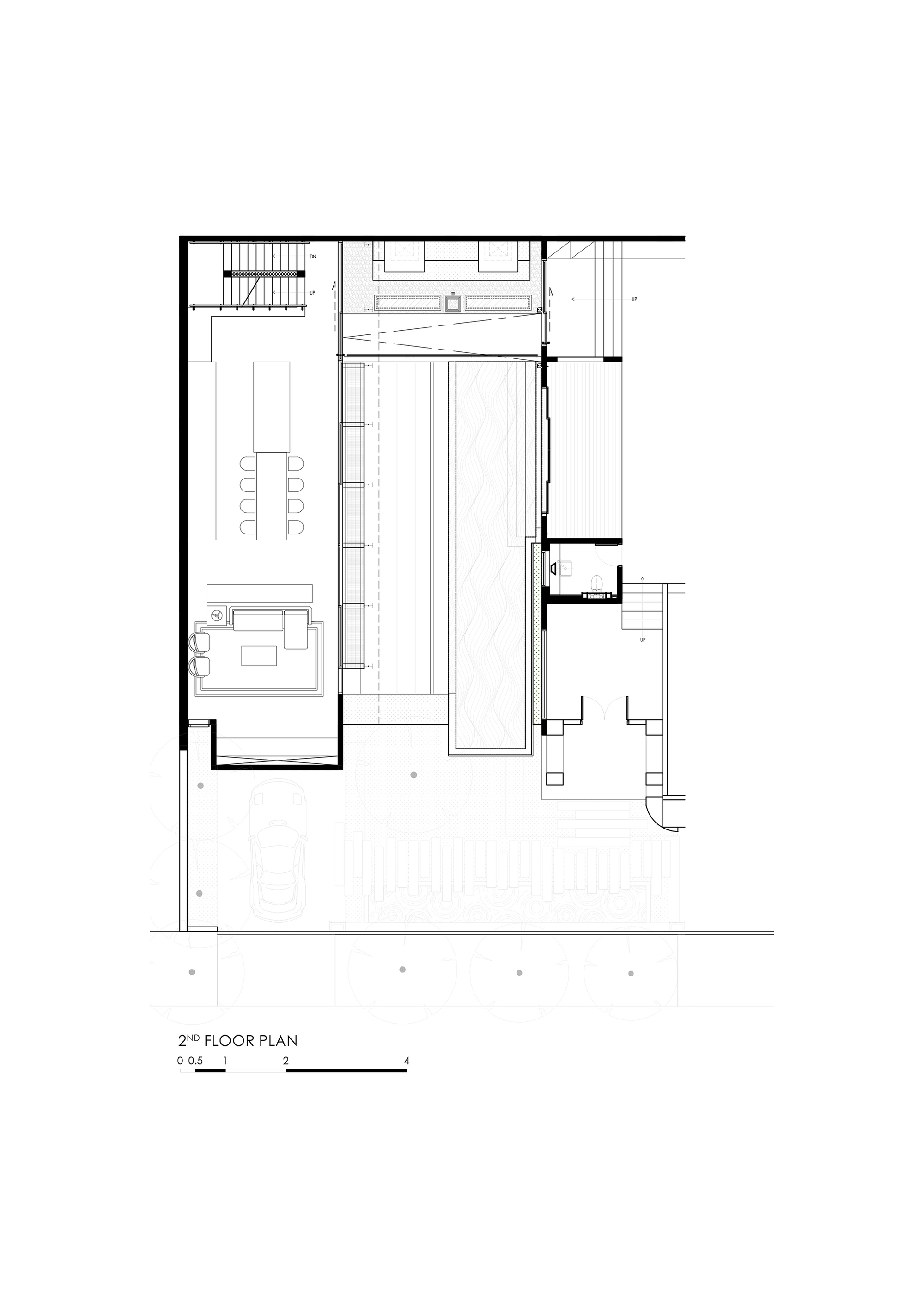 Second floor plan drawing showing living spaces and courtyard void