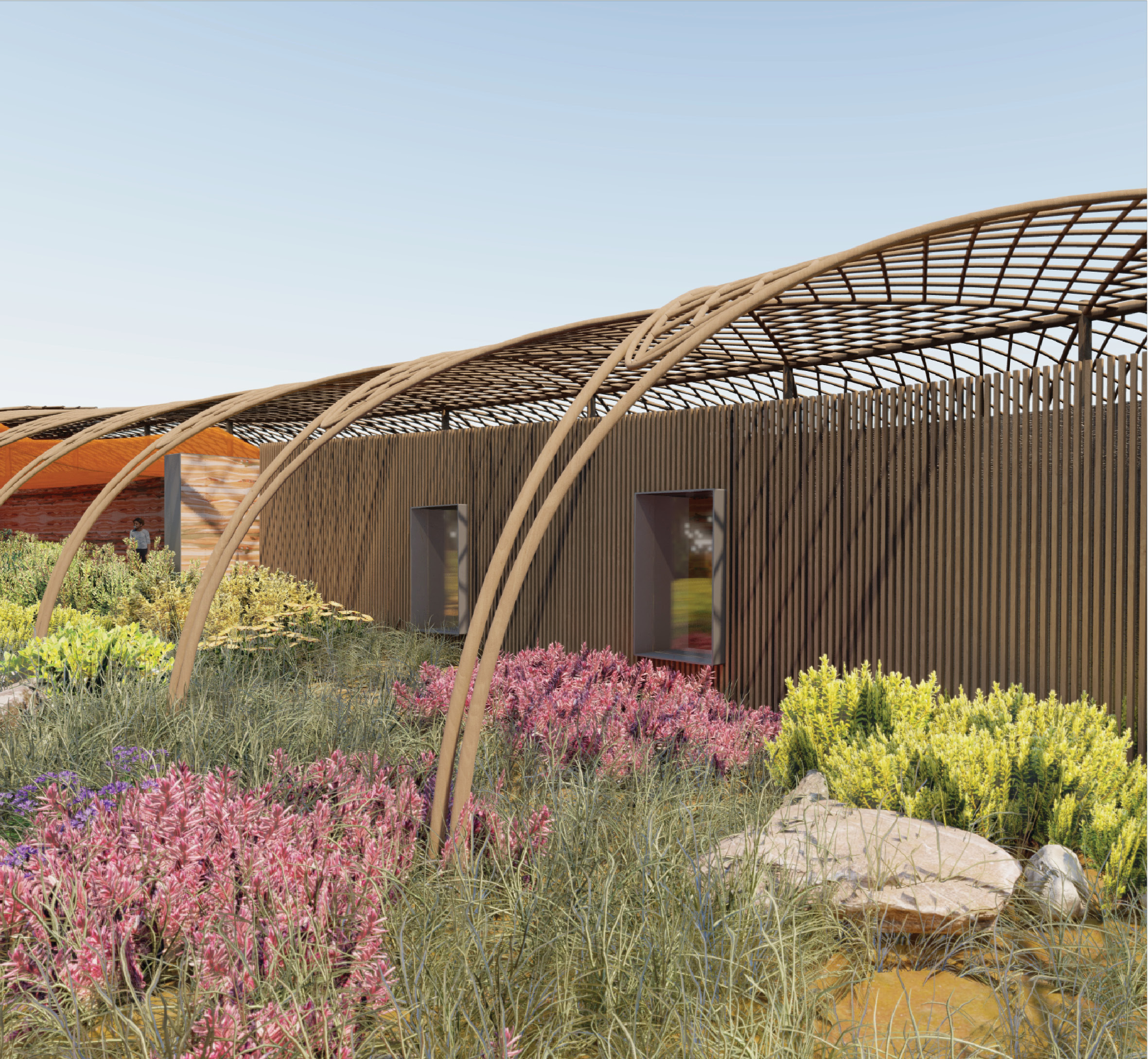 Bamboo-clad residential units merge with lush native planting beneath lightweight trellis structures and shaded pathways.