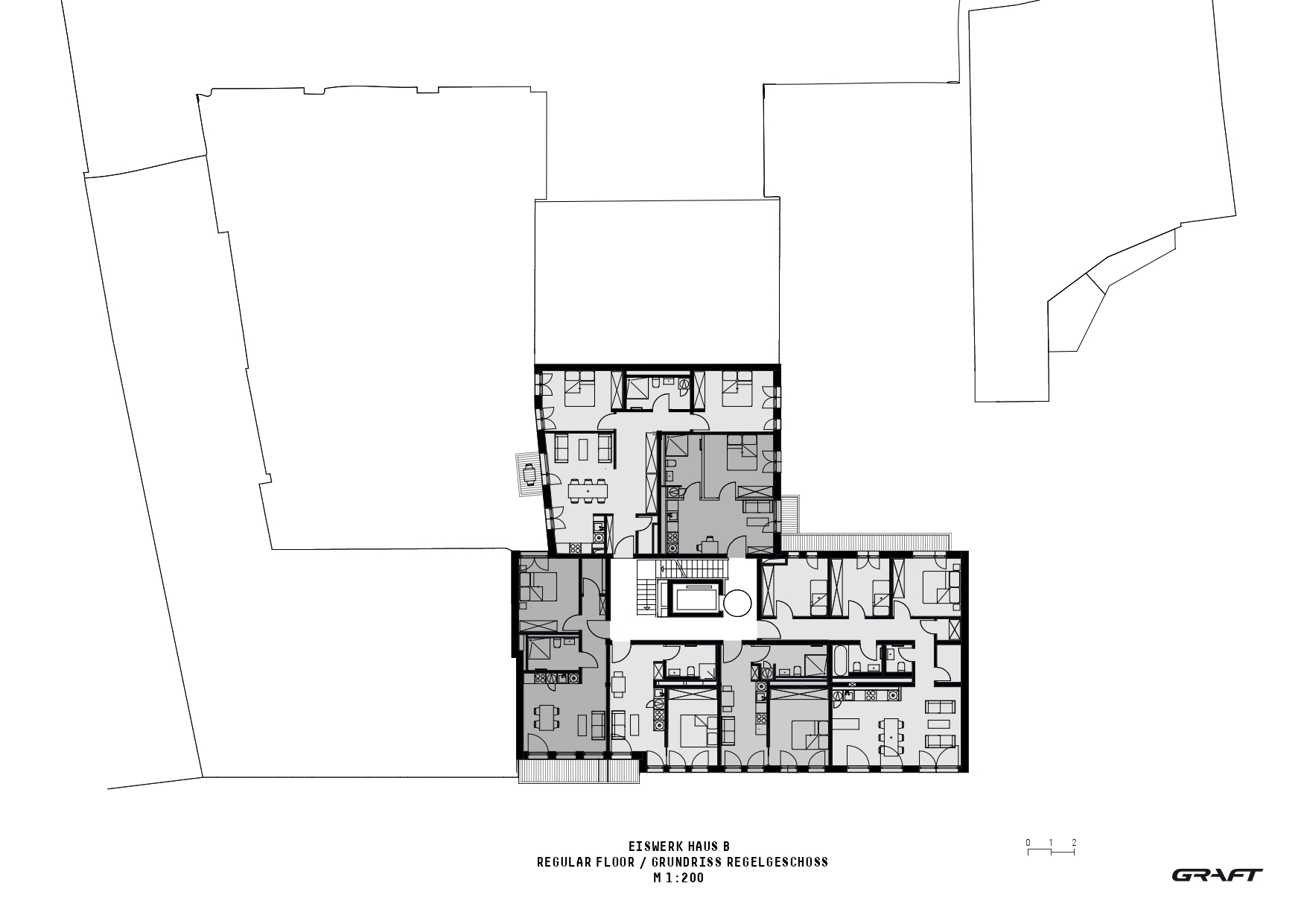 Regular floor plan drawing showing residential units arranged in an L-shaped configuration with a central circulation core