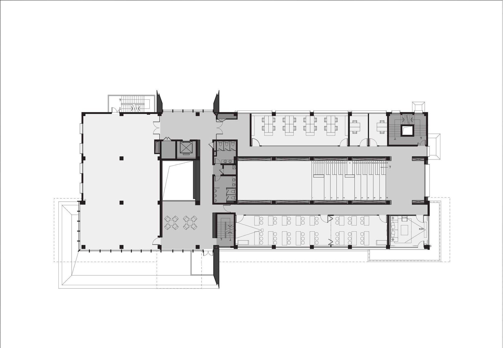 Floor plan drawing showing cellular offices and meeting rooms arranged around a central void