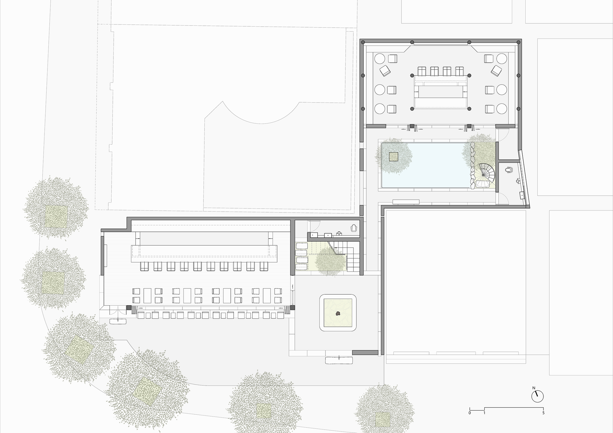 Floor plan drawing showing interconnected rectangular volumes with courtyards and surrounding trees
