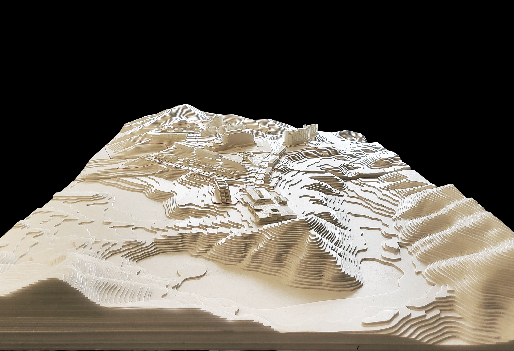 Closer view of the topographic model revealing clustered buildings nestled among contoured terrain