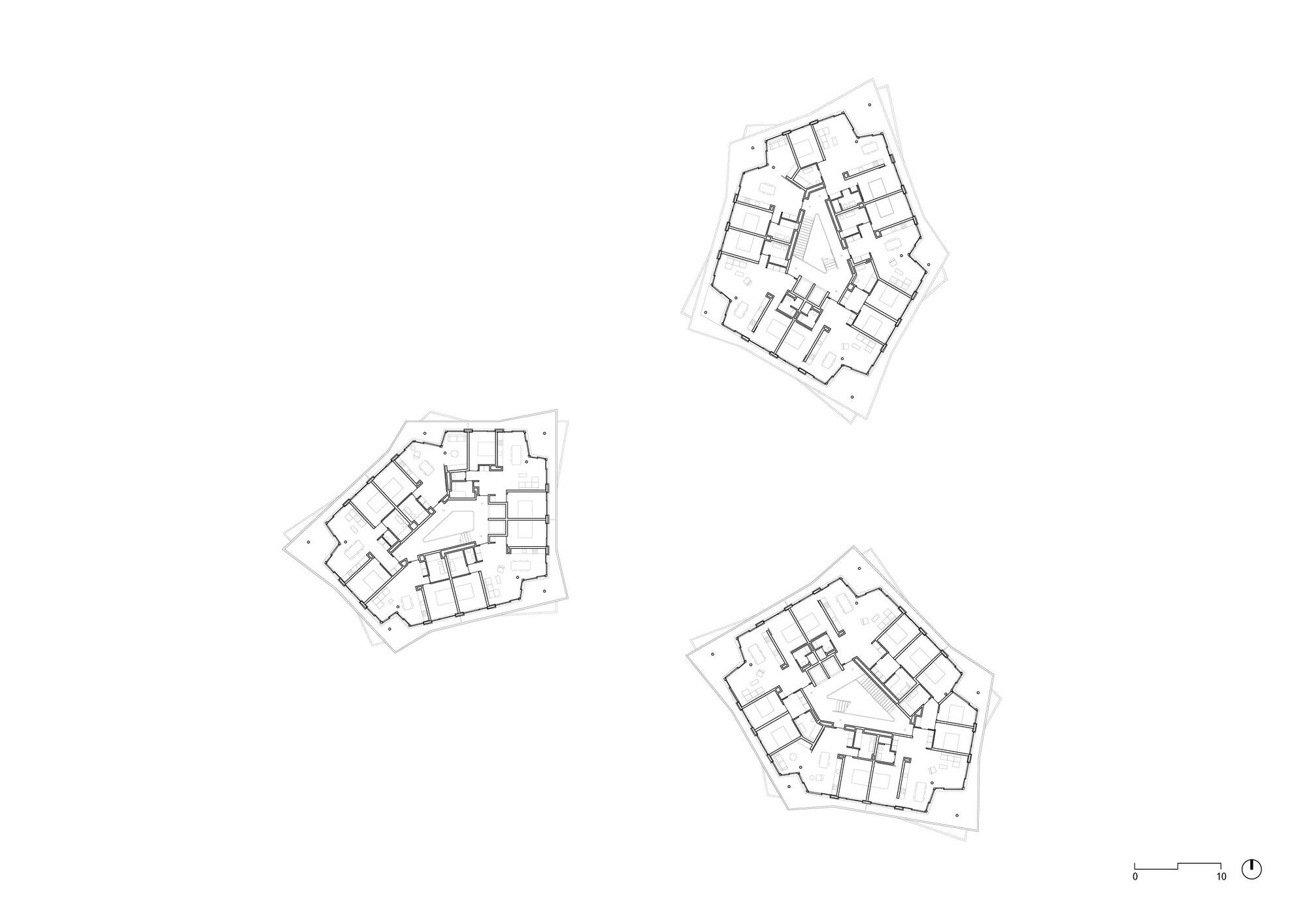 Floor plan drawings showing three pentagonal residential towers with central cores and radiating apartment units
