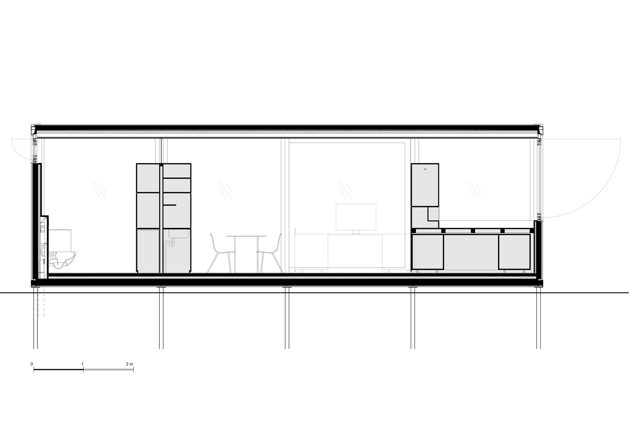 Section drawing showing single-story volume on pilotis with built-in storage units flanking living area