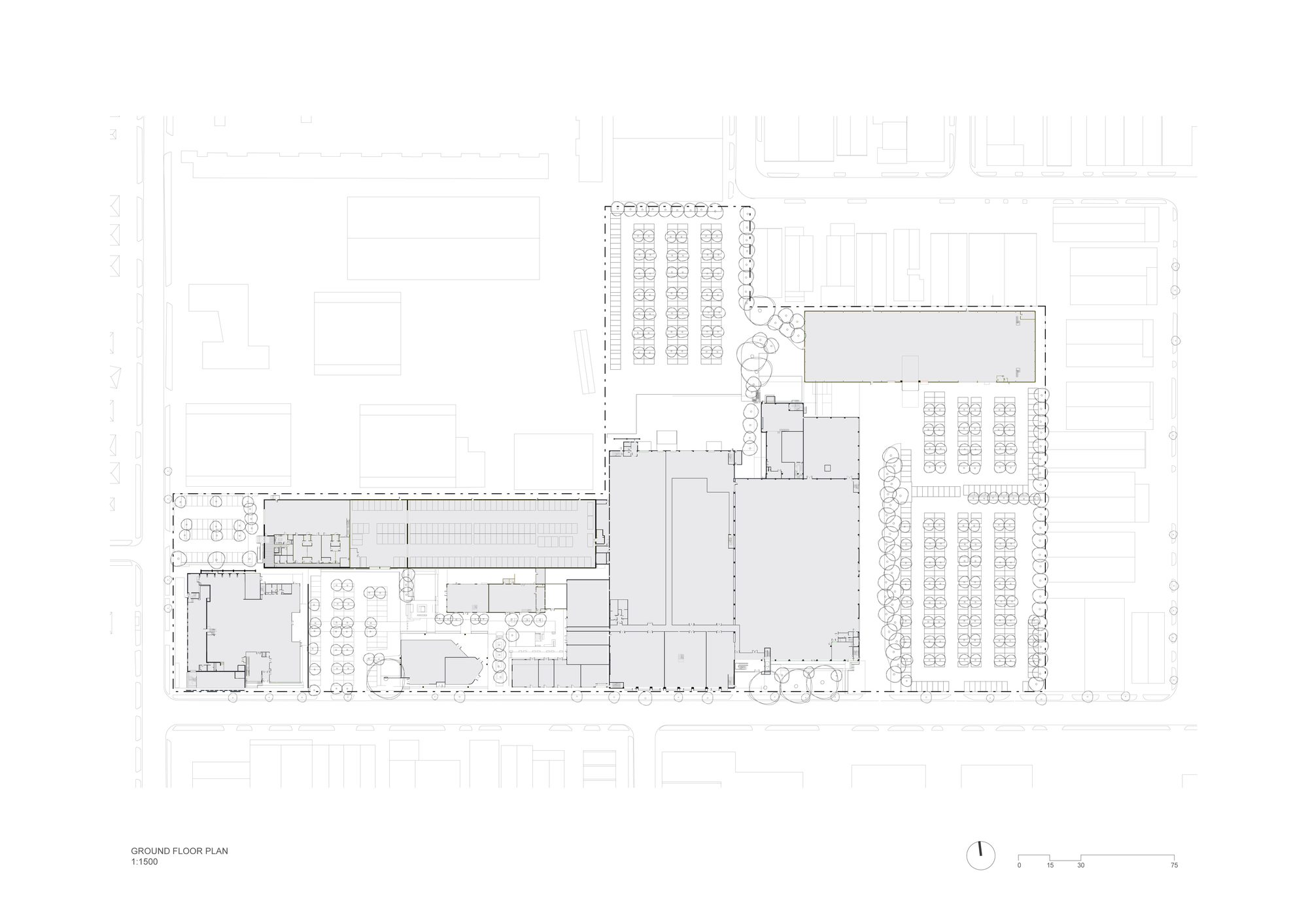 Ground floor plan drawing showing L-shaped layout with open spaces and adjacent parking areas