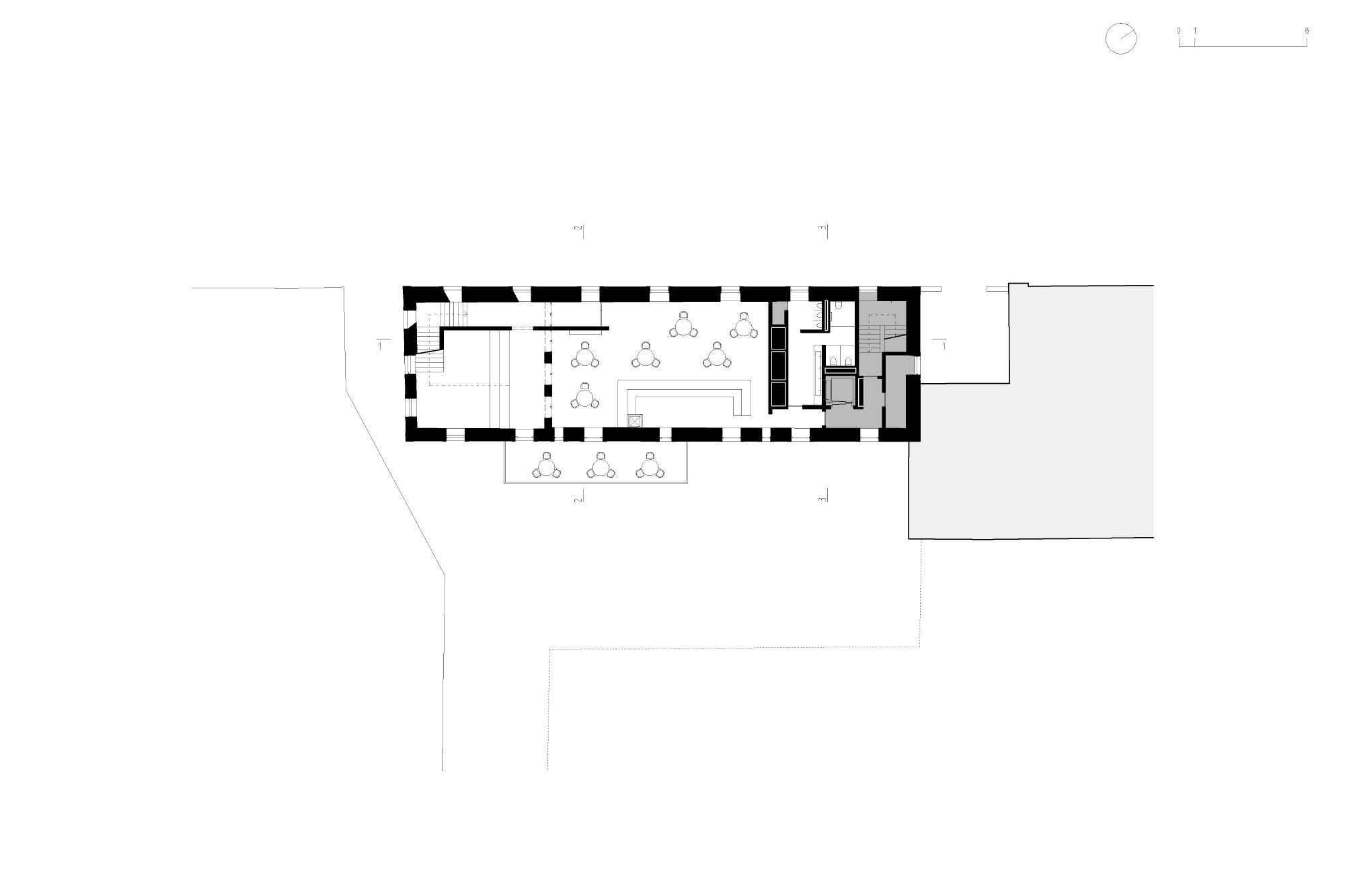 Upper floor plan drawing showing a continuous interior space with seating areas and adjacent service rooms
