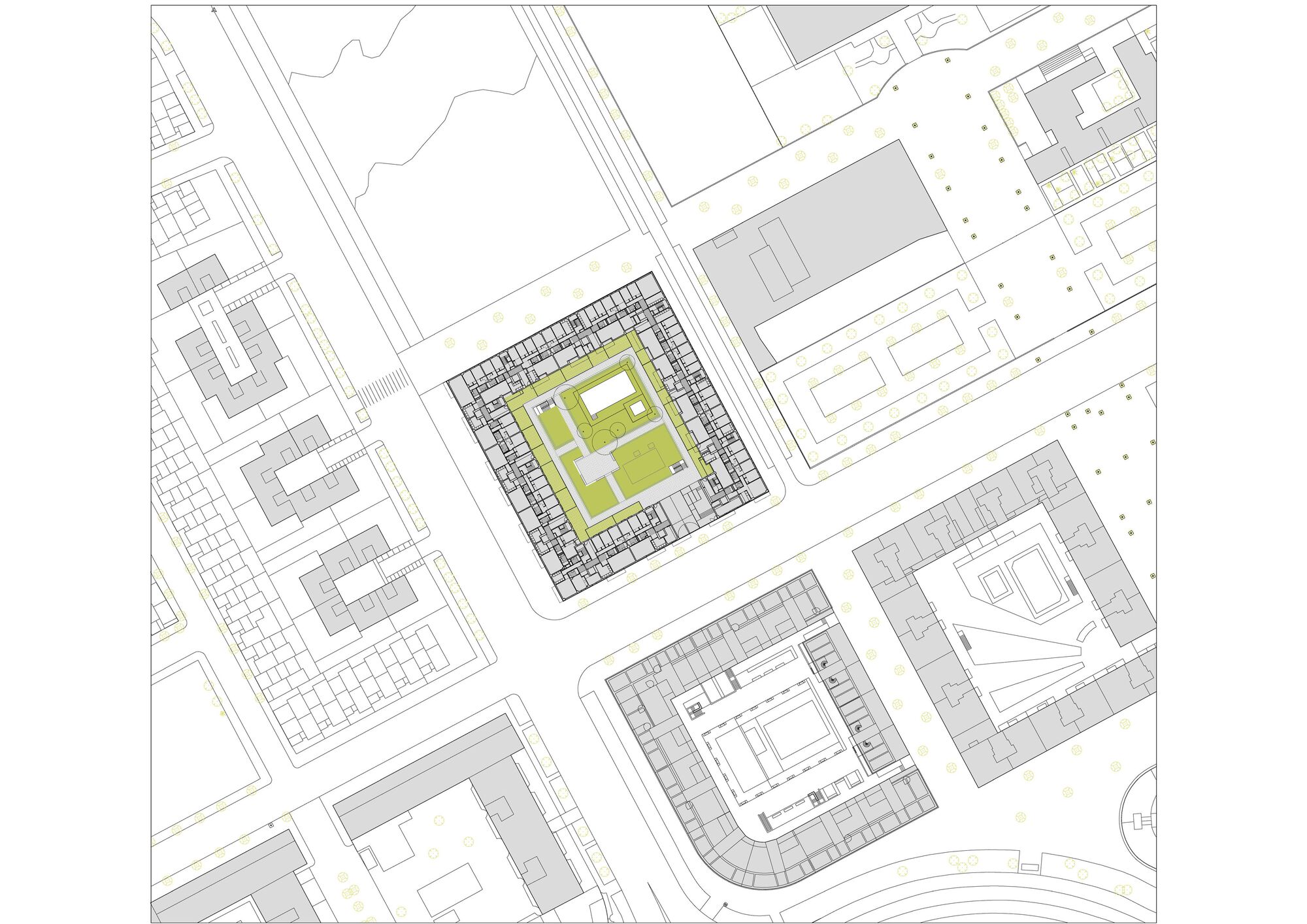 Site plan showing a square perimeter block with a central green courtyard among surrounding urban blocks