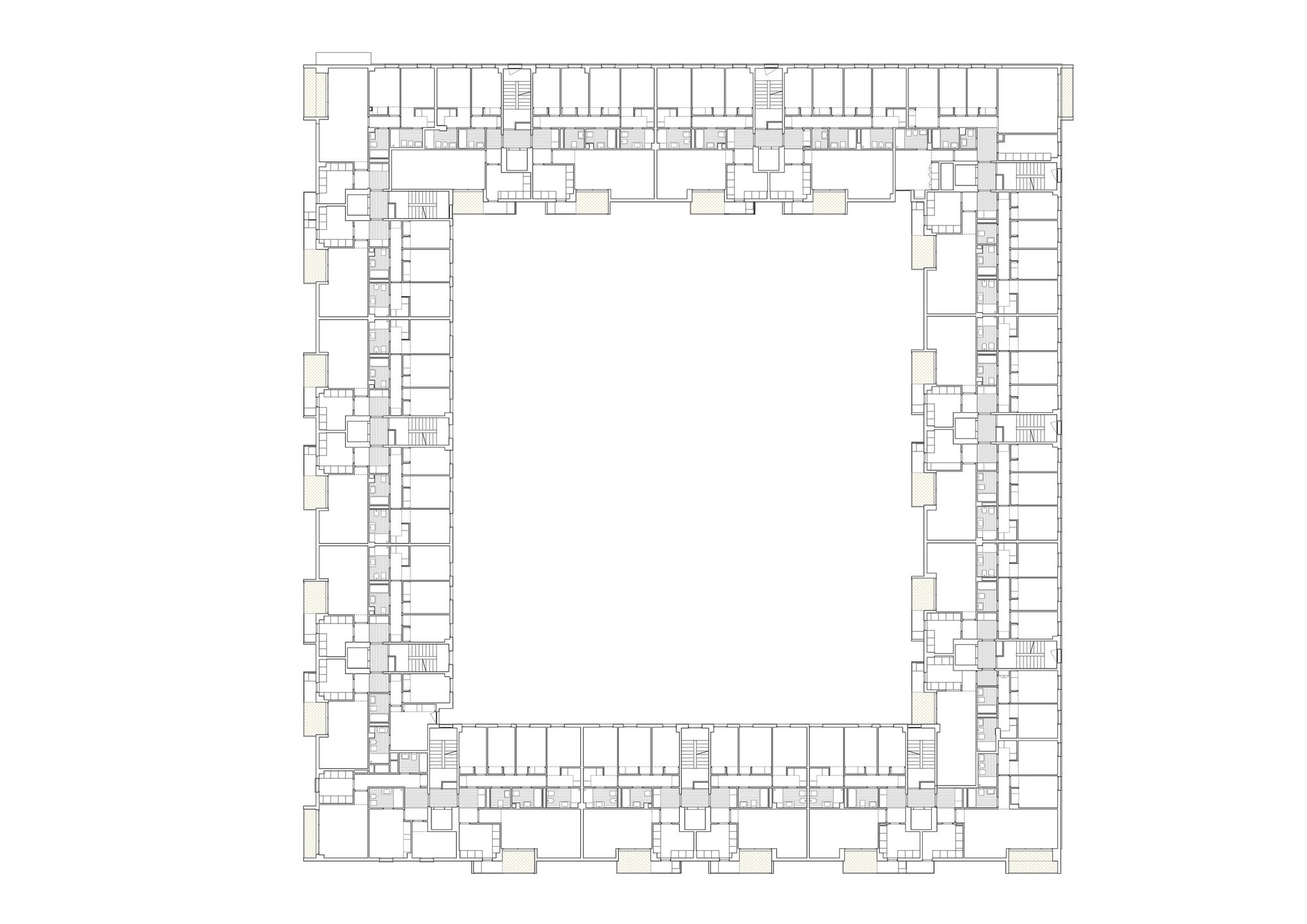Floor plan drawing showing residential units arranged around a large open central courtyard space
