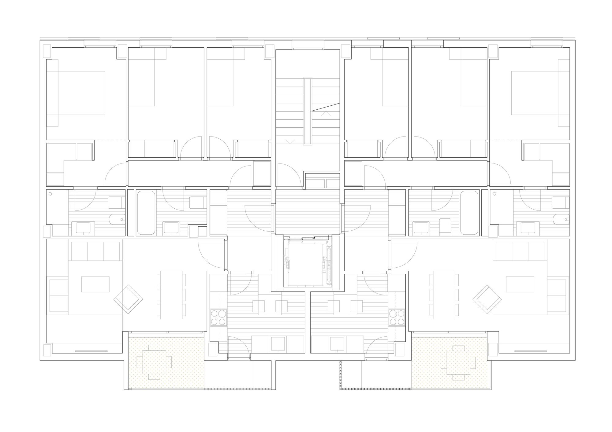 Floor plan showing symmetrical residential units arranged around a central stair and elevator core