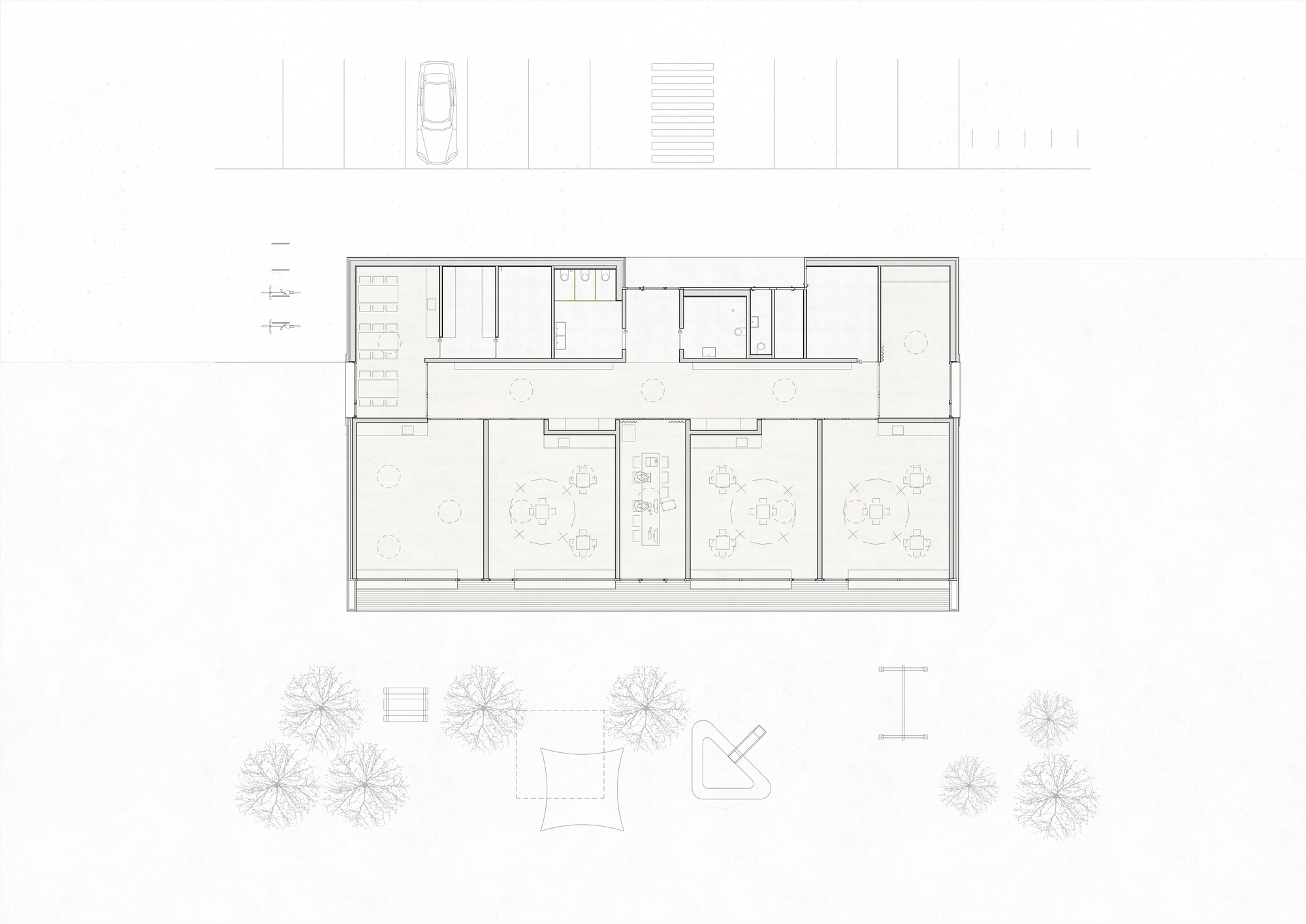 Floor plan drawing showing classroom layout with three large rooms and central service core