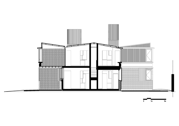 Section drawing revealing staggered volumes with textured cladding and a central staircase