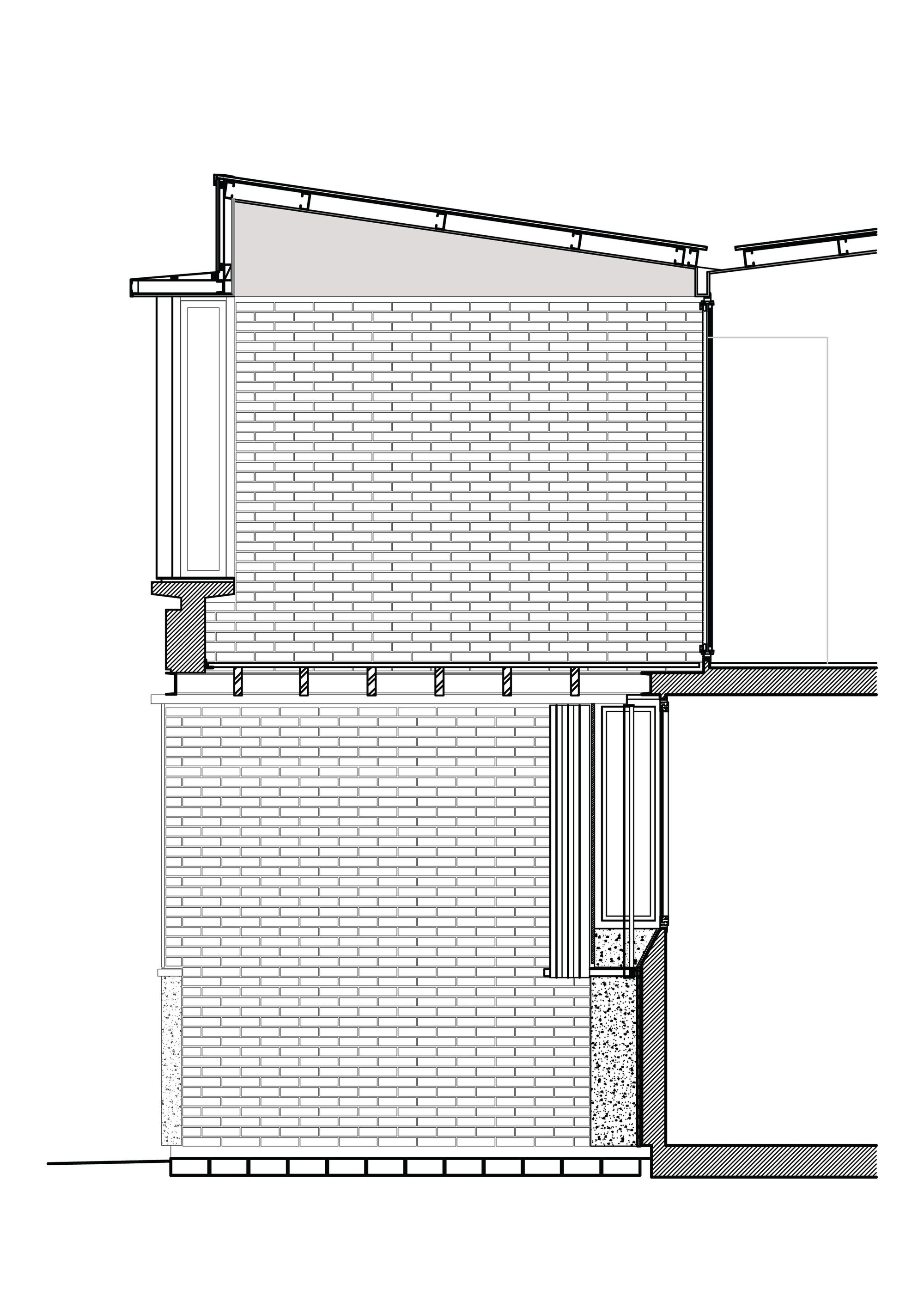 Section drawing showing brick walls, exposed timber roof structure and floor assembly details