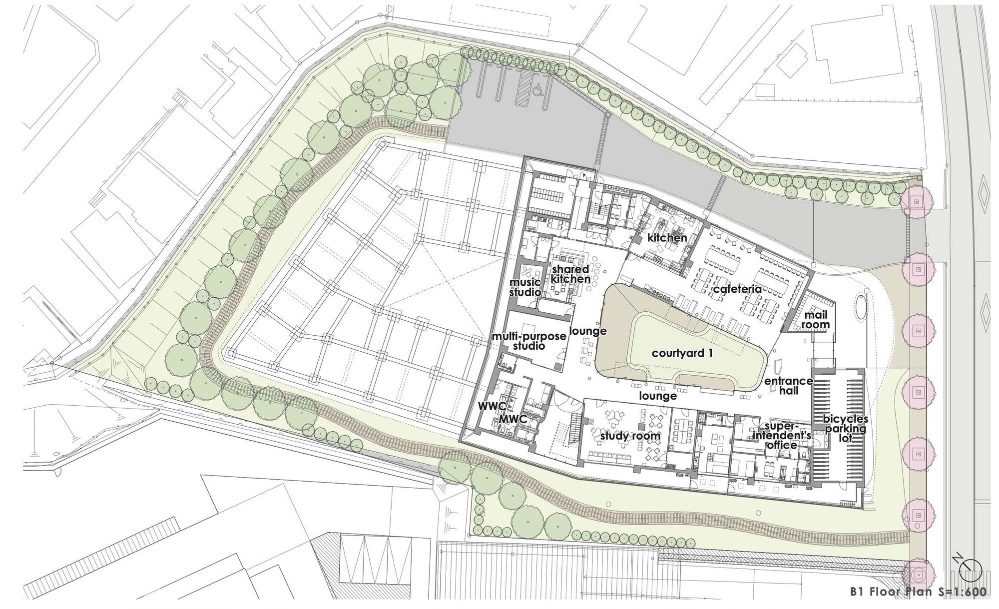 Site plan drawing showing the building footprint with labeled interior spaces and perimeter landscaping