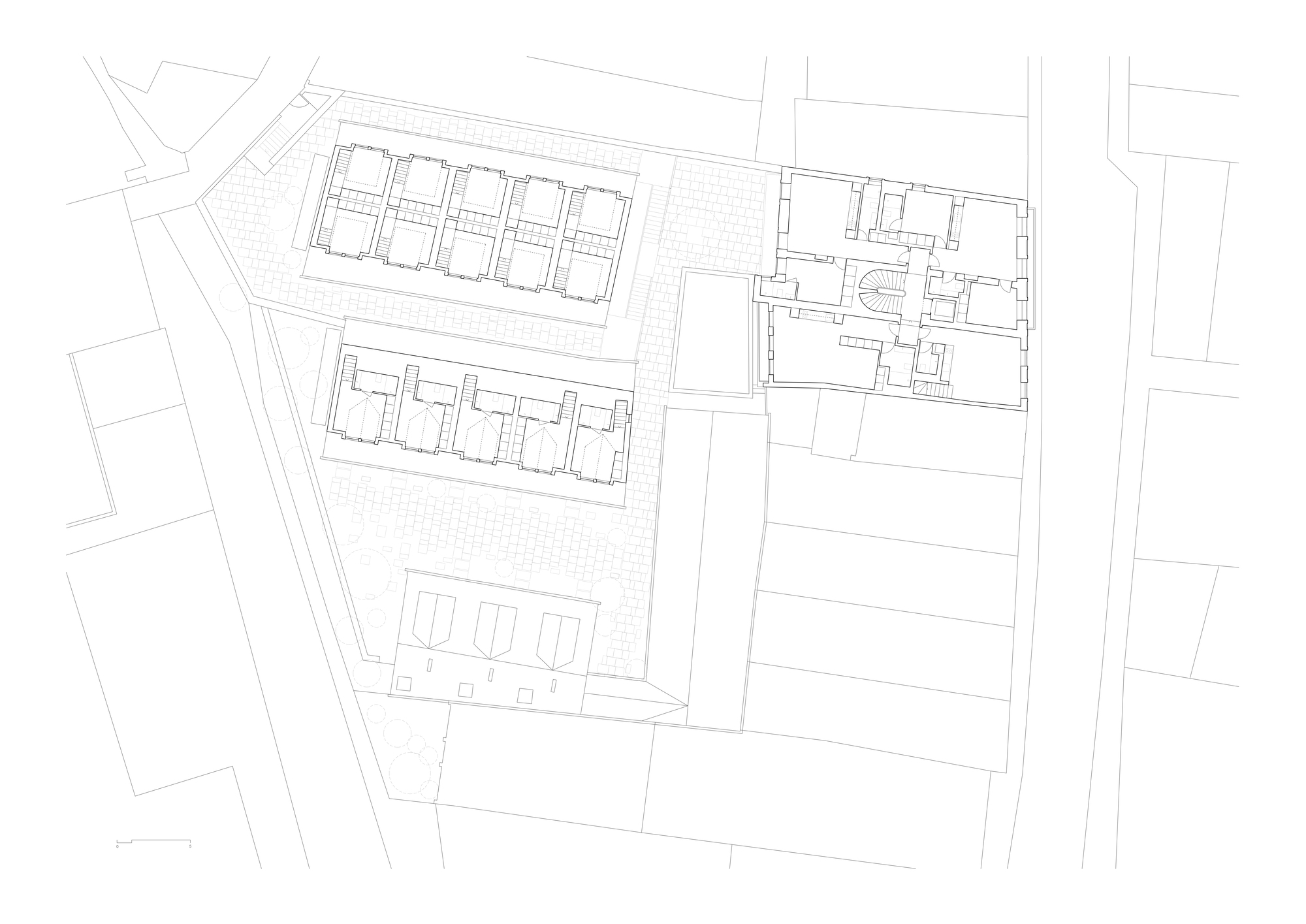 Upper floor plan drawing showing row housing units with pitched roof outlines and adjacent building wing