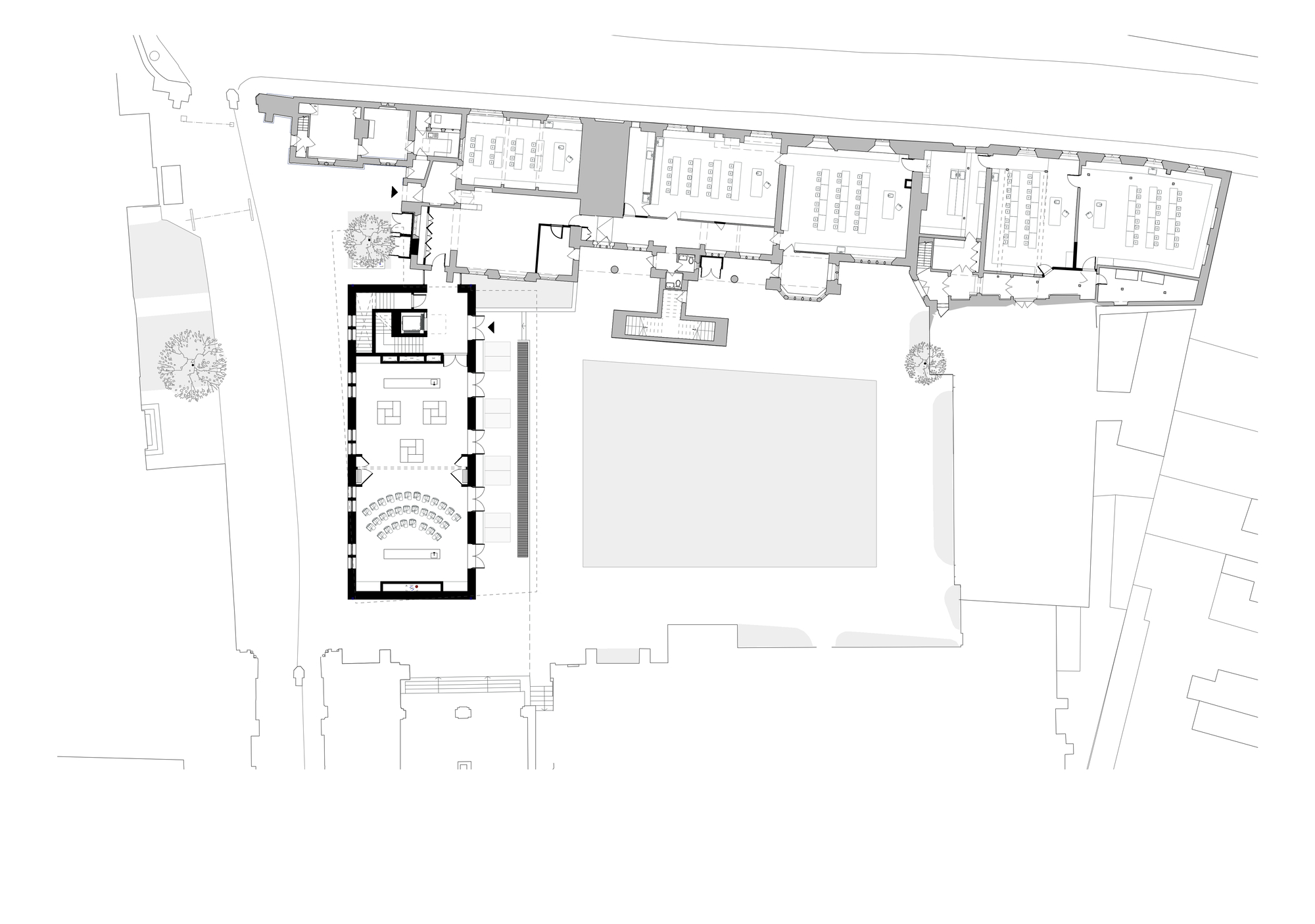 Ground floor plan drawing showing the chapel with curved seating and adjacent courtyard and buildings