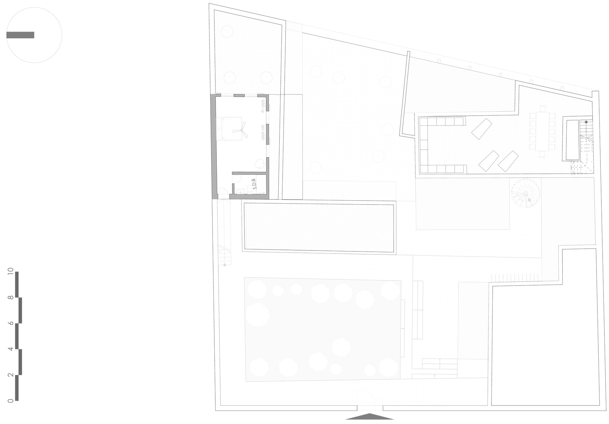 Floor plan drawing showing two rectangular pools with surrounding decks and service rooms at perimeter