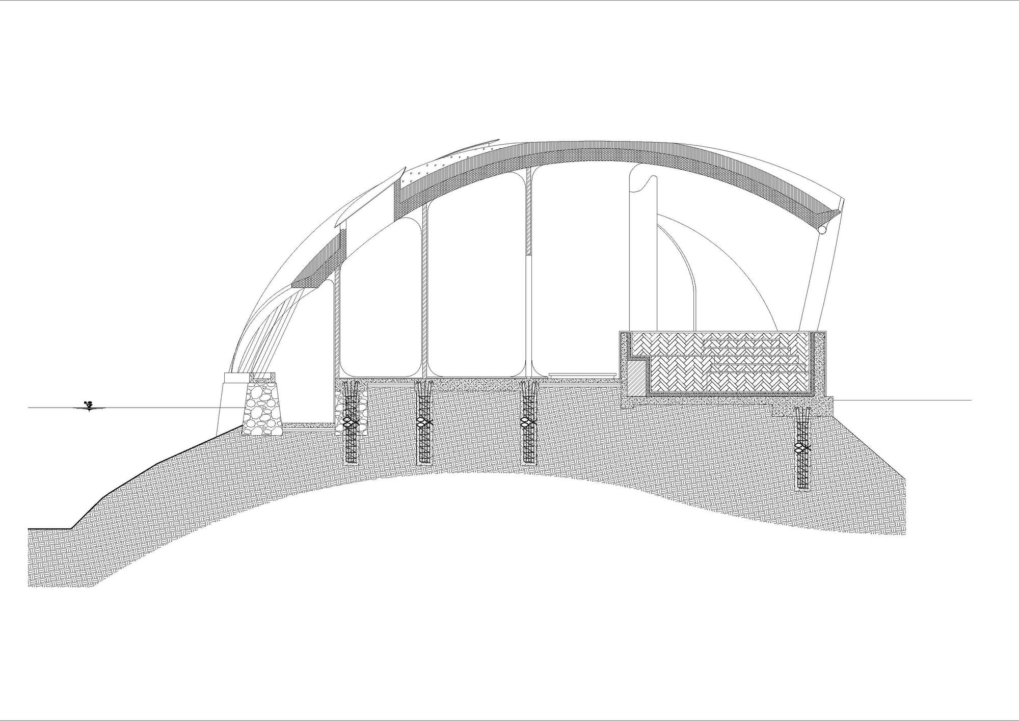 Section drawing showing an arched roof structure with vertical columns anchored in sloped terrain