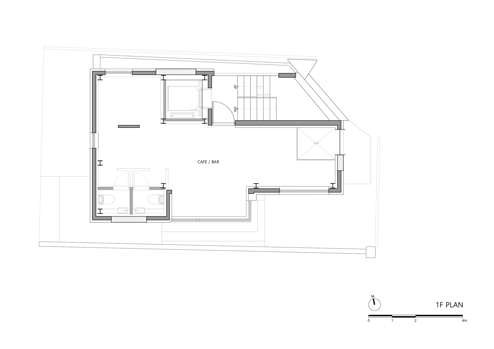First floor plan drawing showing cafe and bar space with restrooms and staircase