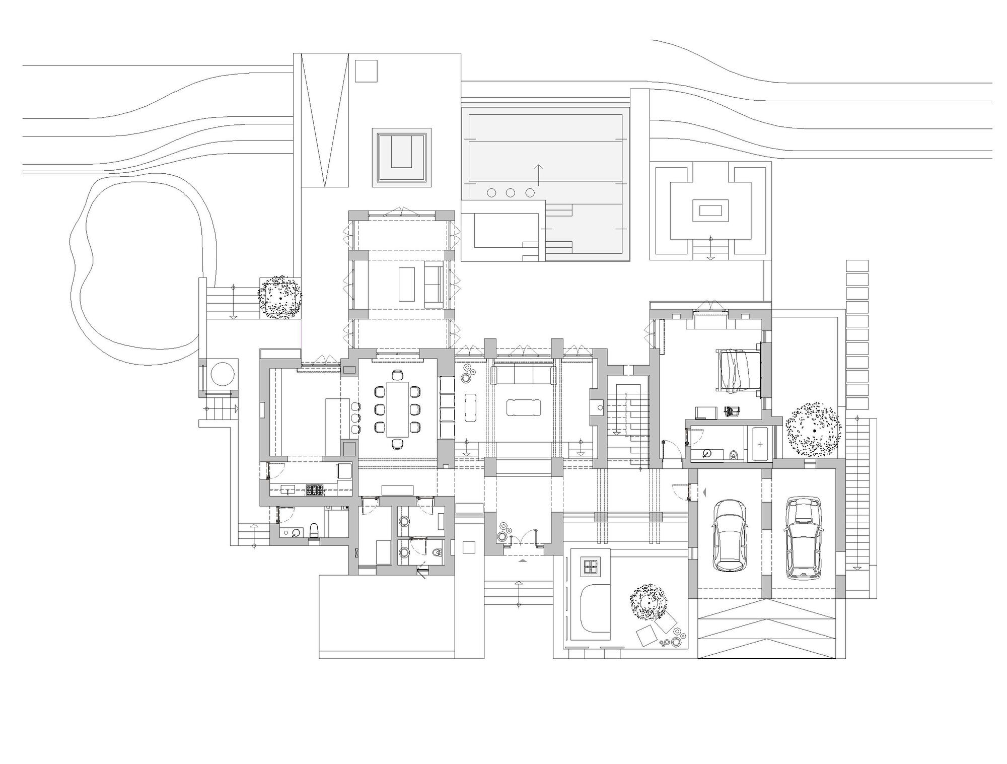 Floor plan drawing depicting room divisions, furniture placement, and site context with contour lines
