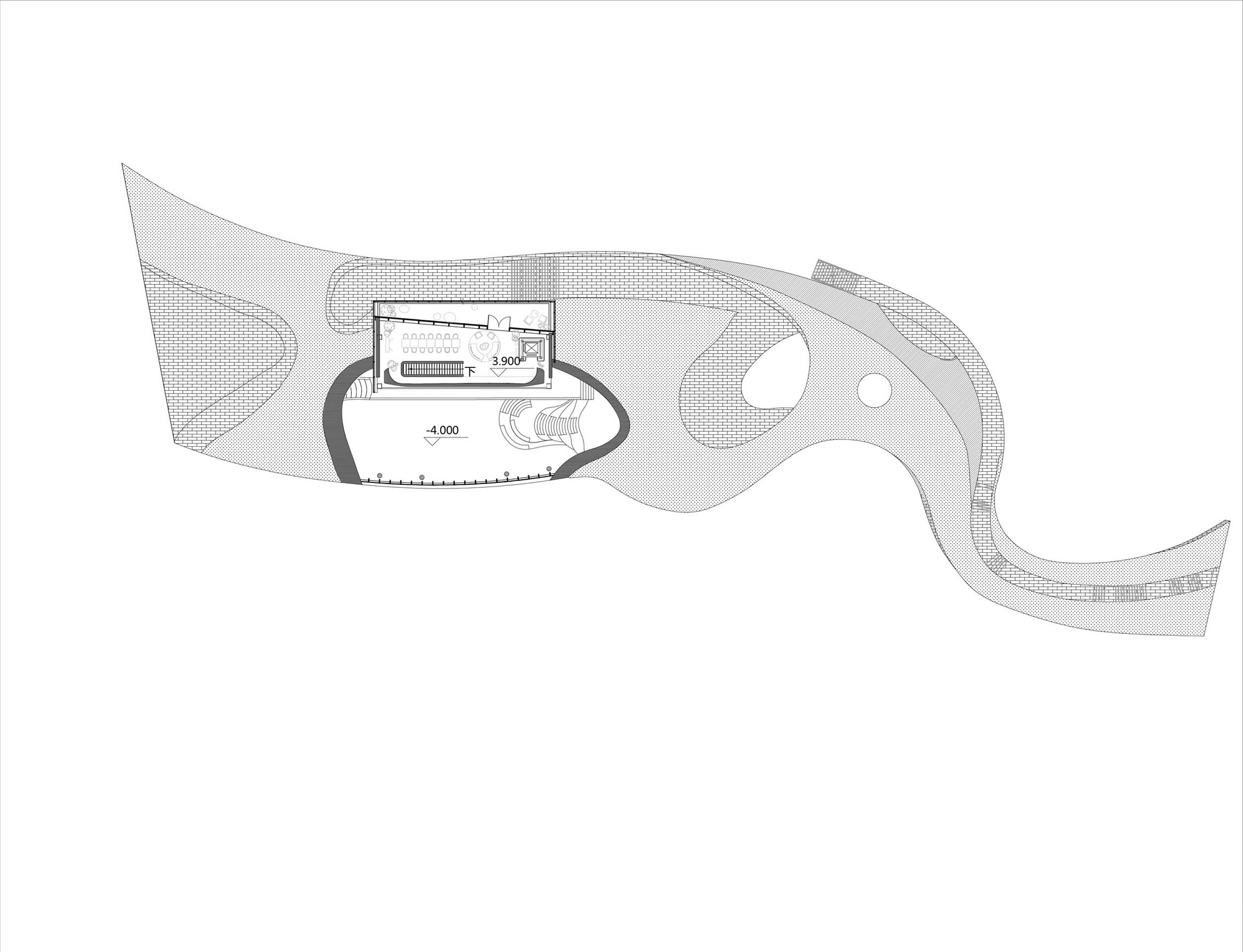 Floor plan drawing of a single lobed volume with organic perimeter and central programmatic spaces