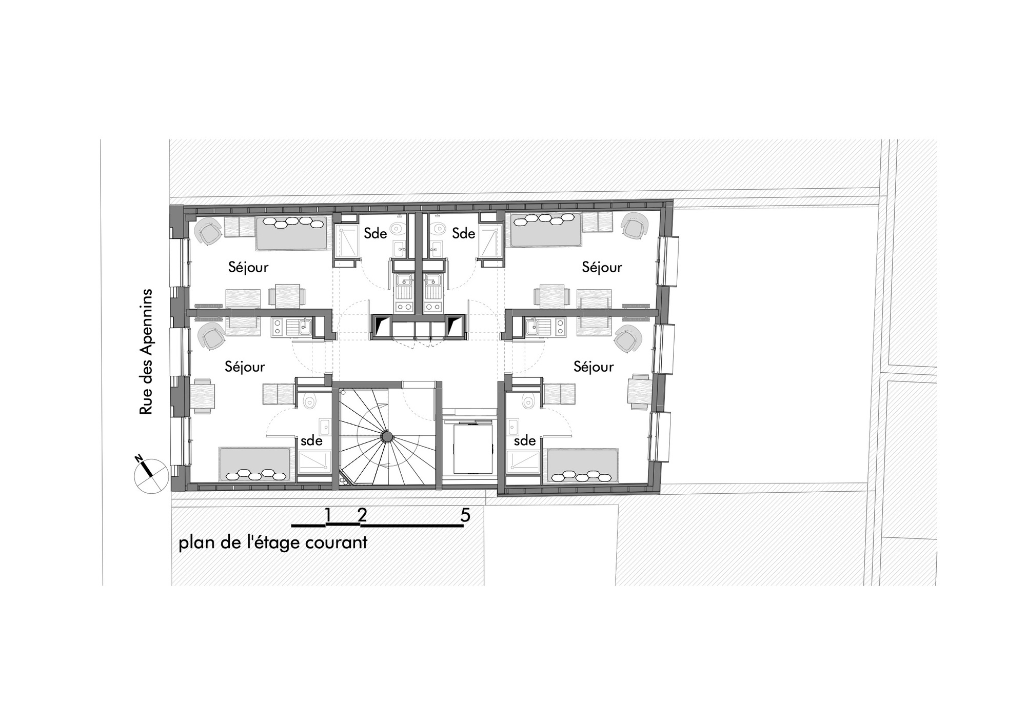 Upper floor plan drawing showing four residential units arranged symmetrically around a central stair and elevator core