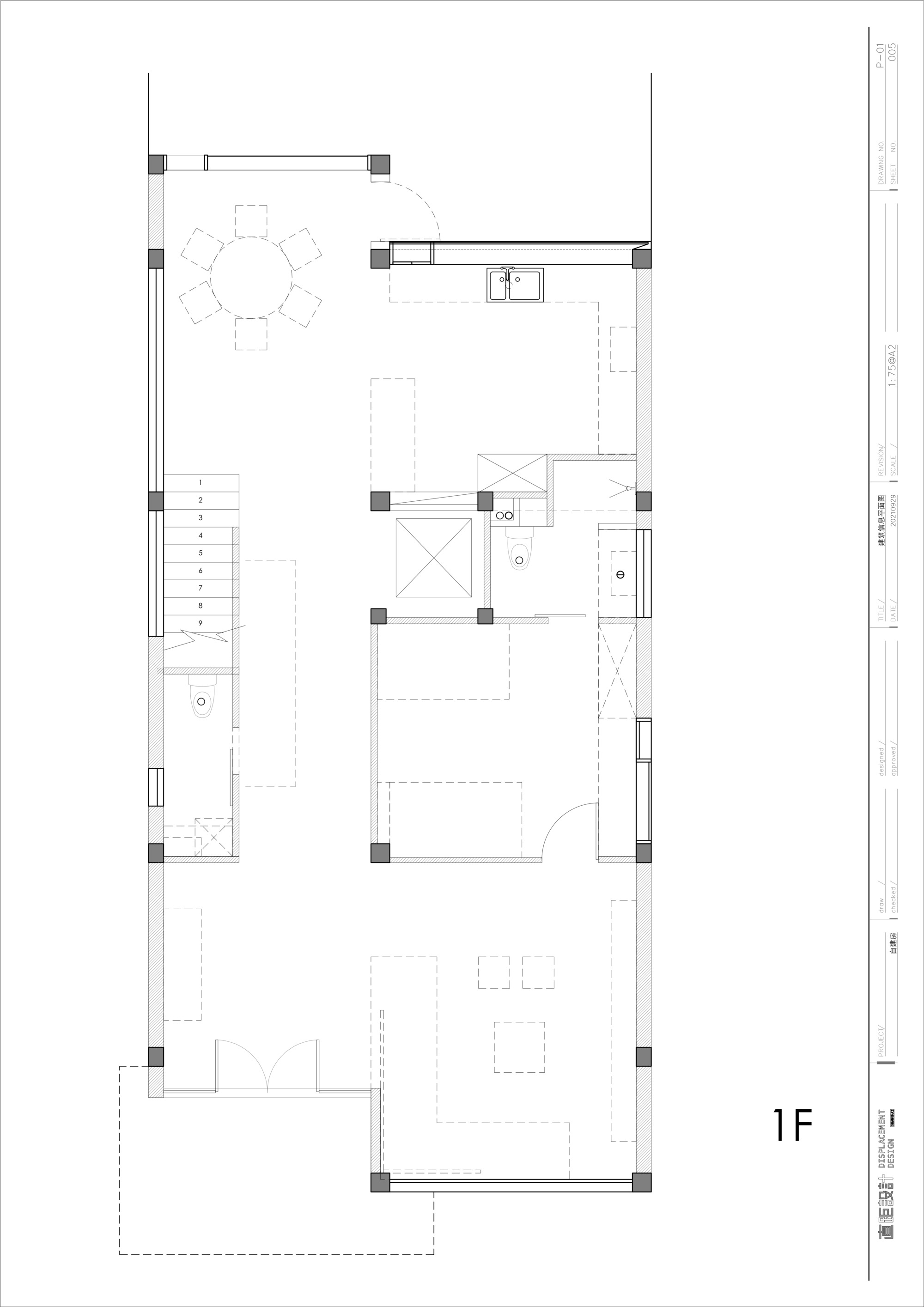 First floor plan showing dining area, kitchen, staircase, and outdoor terrace spaces
