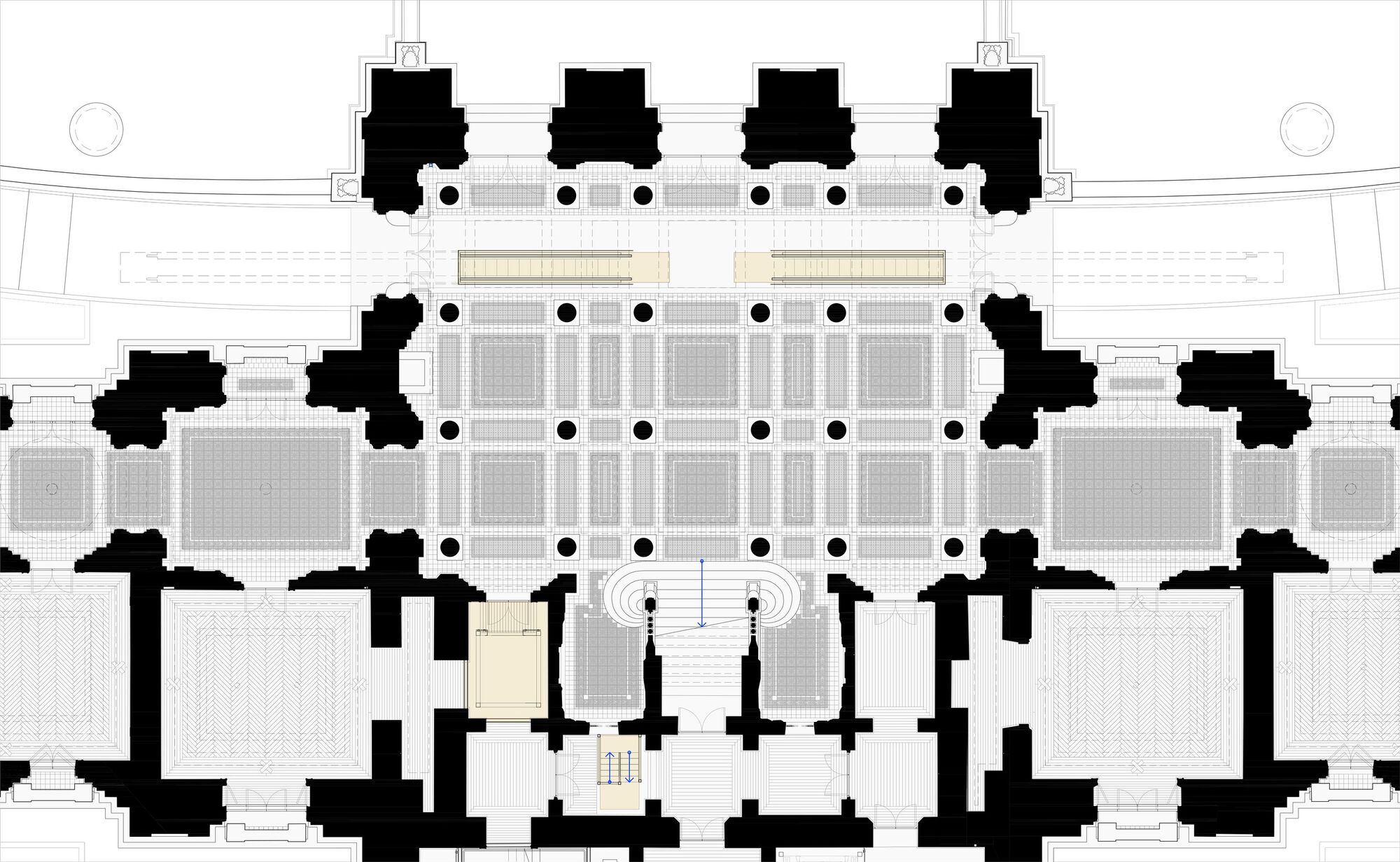 Floor plan drawing showing solid masses in black surrounding a grid of rooms and central entrance sequence