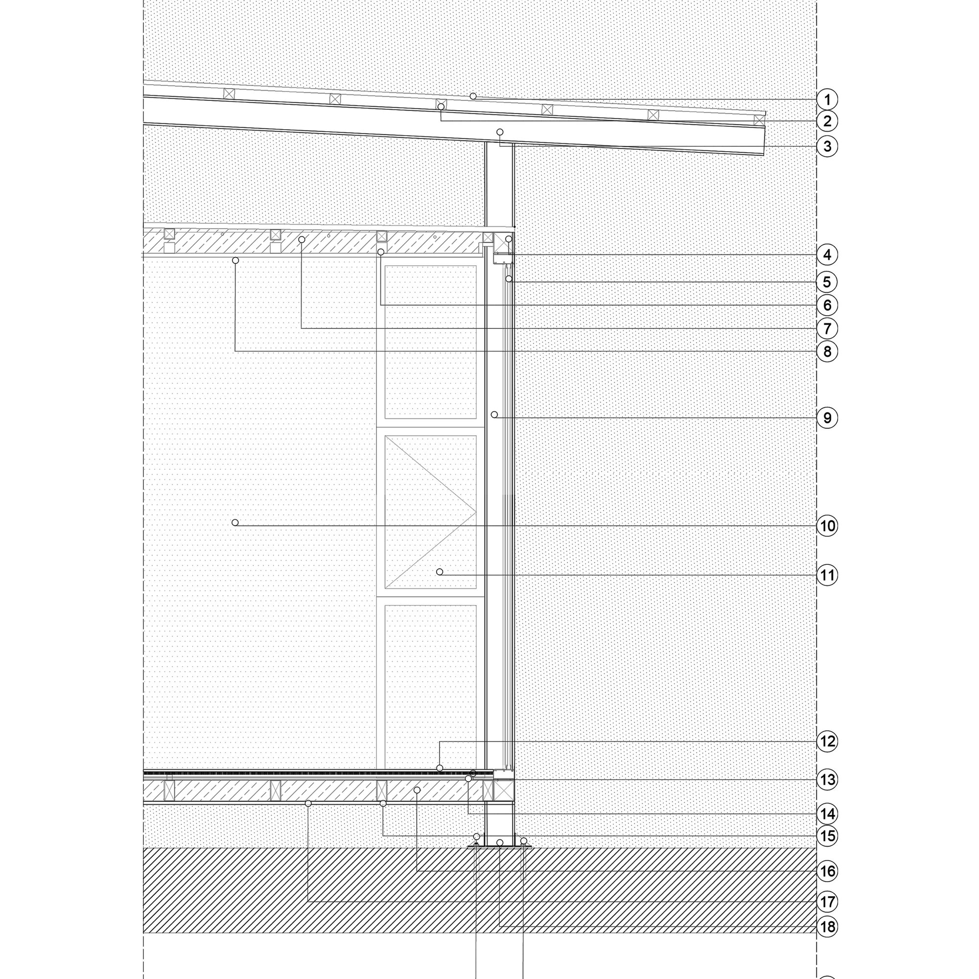 Section detail drawing through the wall assembly showing insulation layers, structural framing, and foundation connection