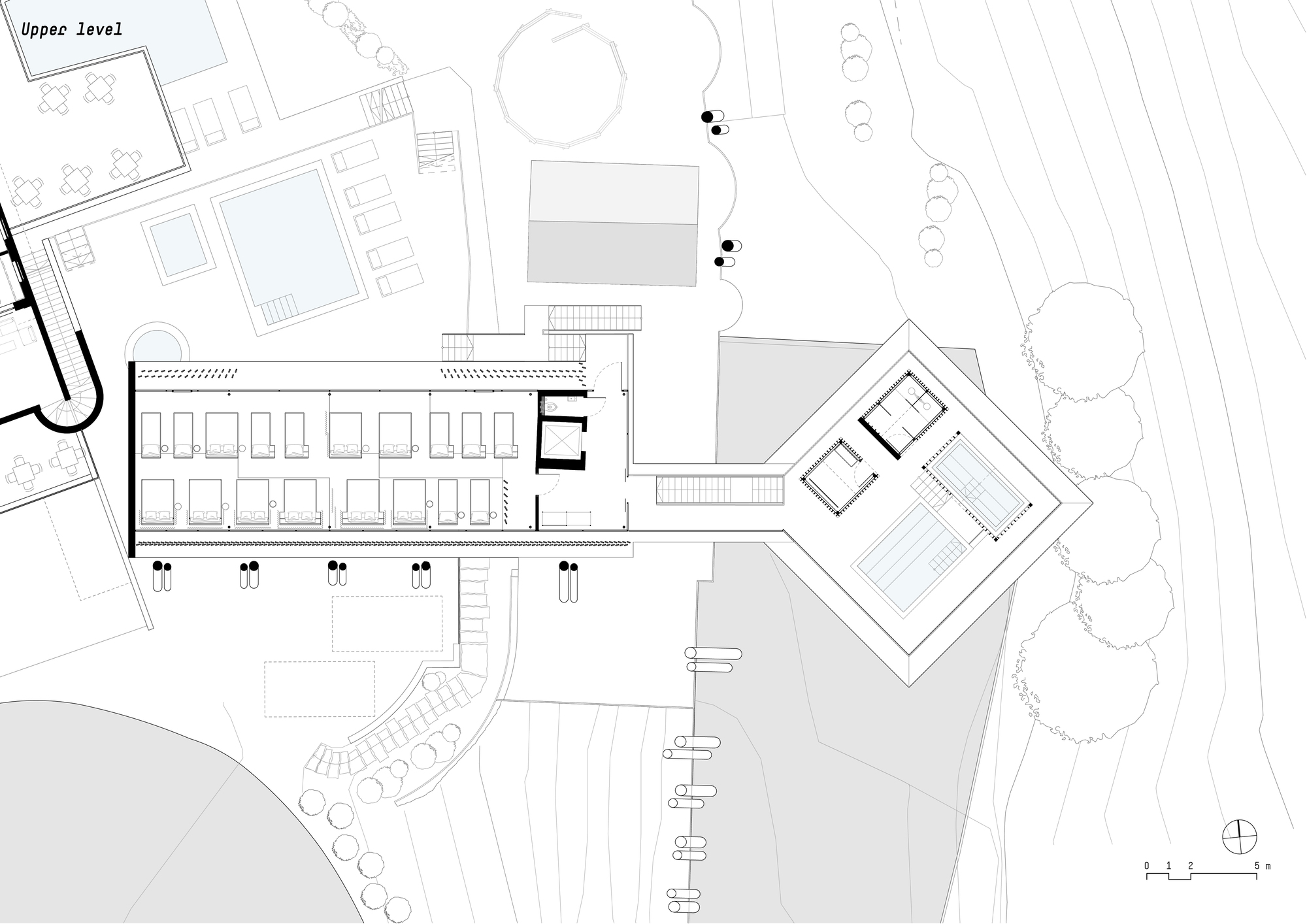 Upper level floor plan drawing showing the pool deck and angled secondary volume