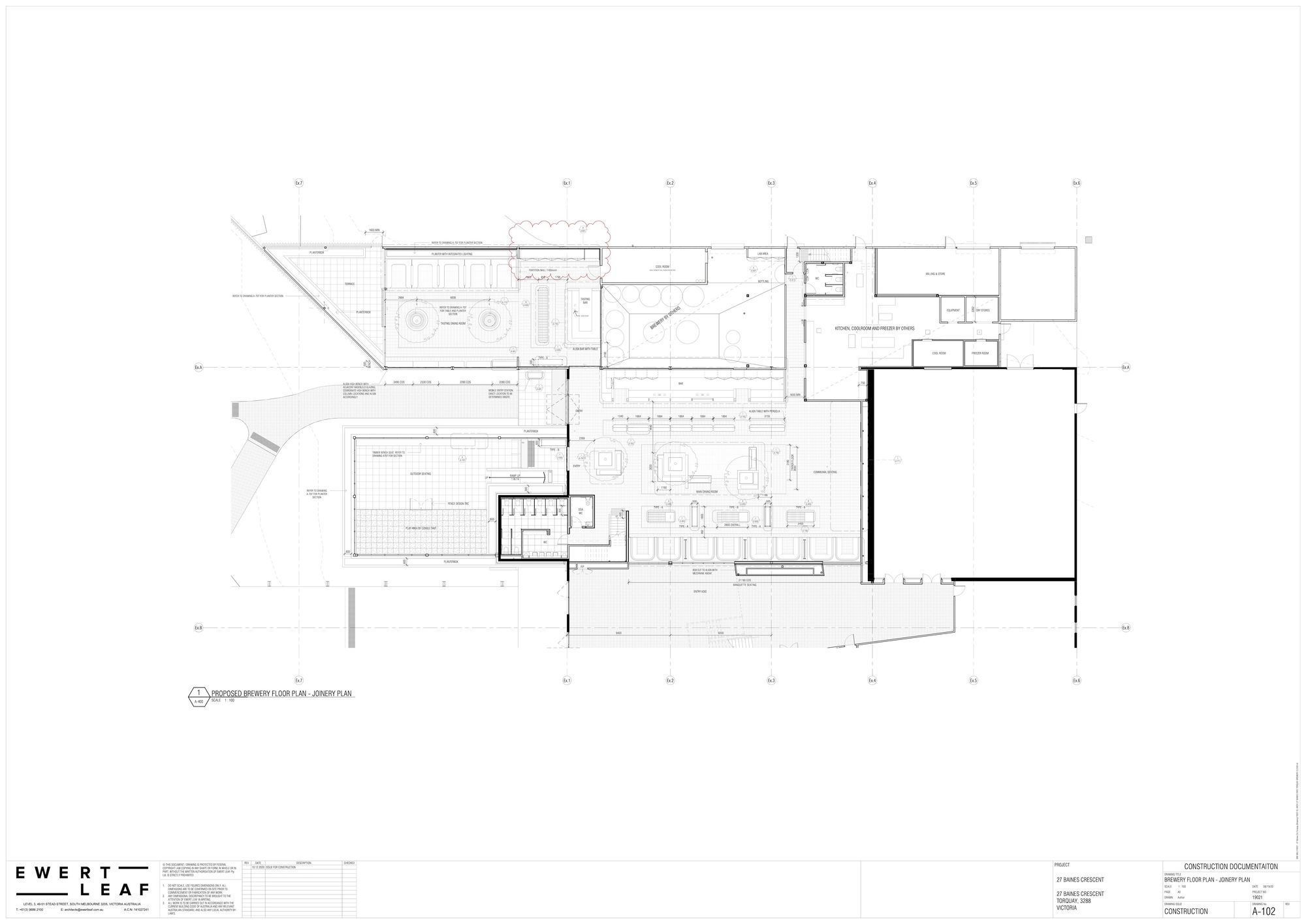 Floor plan drawing depicting multiple dining zones, restrooms, and service areas in an irregular layout