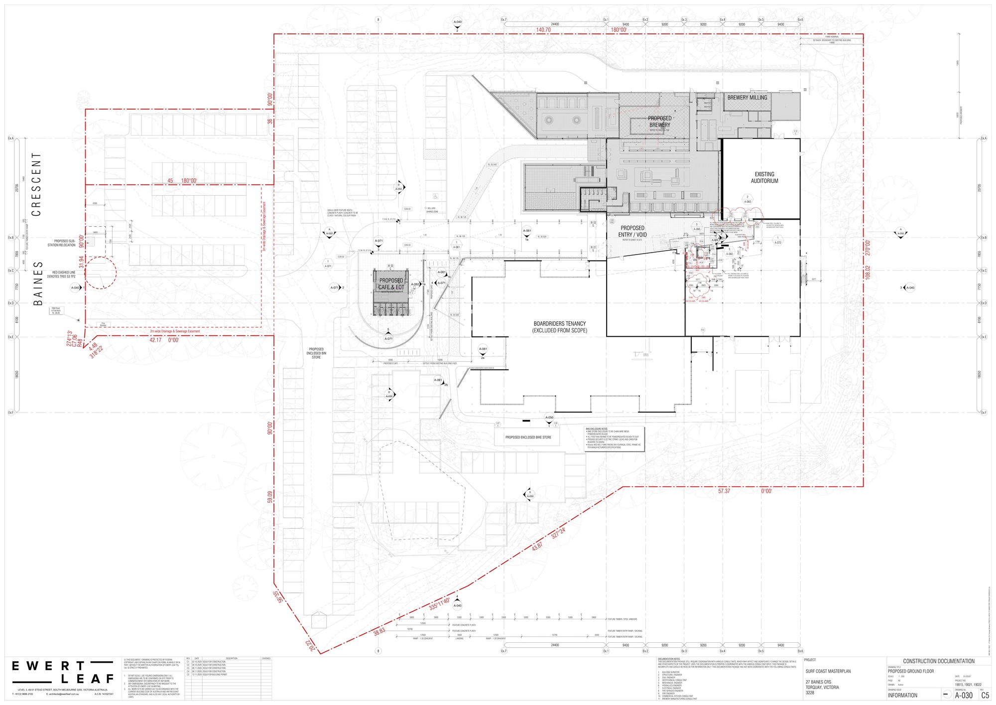 Site plan drawing showing building footprint with parking areas and landscaping elements outlined in red