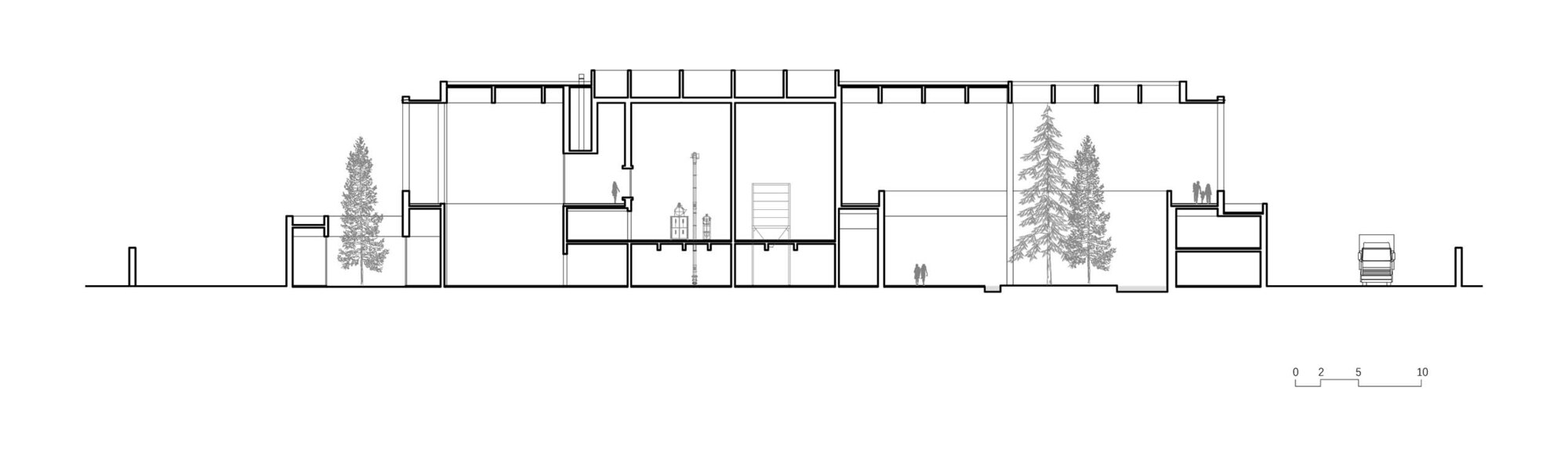 Section drawing showing interior spaces with clerestory windows and trees in courtyard areas