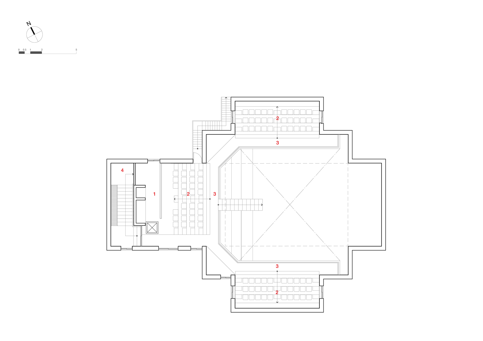 Floor plan showing a central auditorium volume with cruciform seating arrangement and surrounding circulation spaces