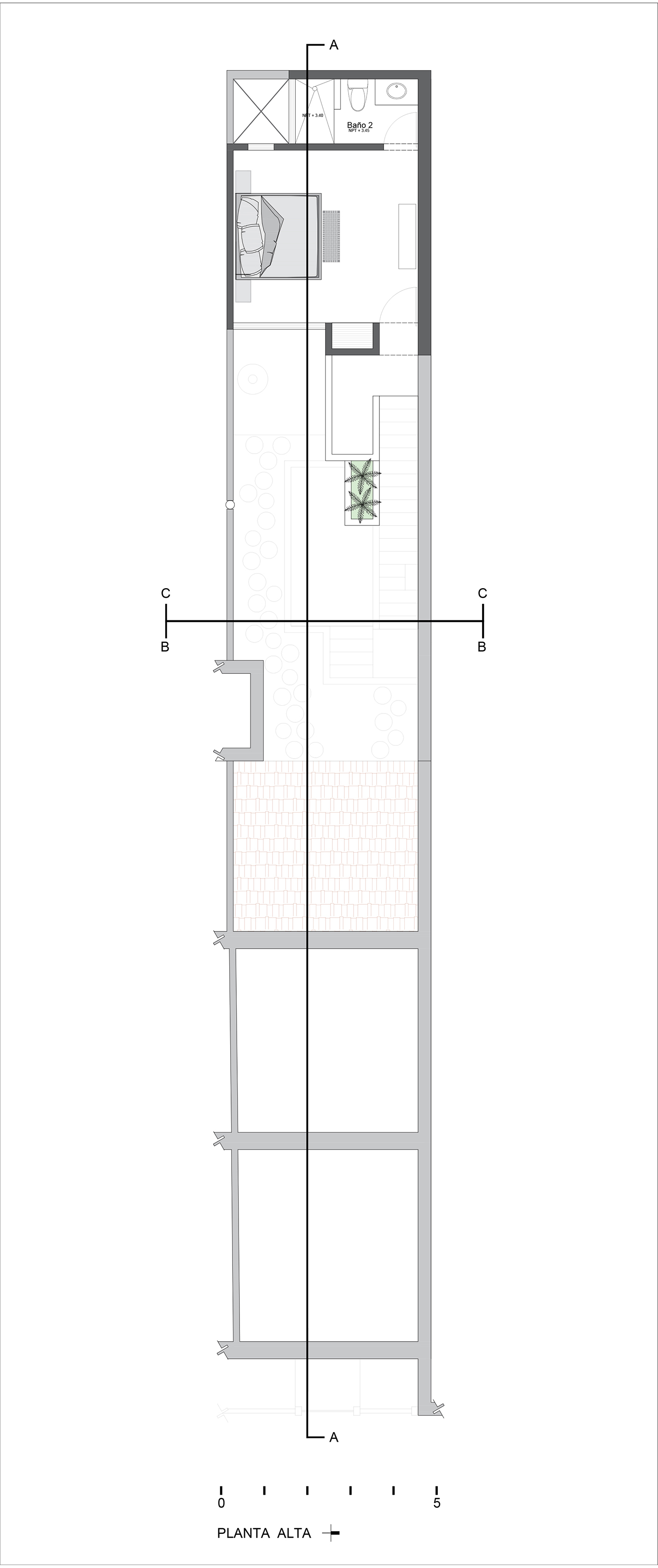 Upper floor plan drawing depicting narrow layout with staircase and multi-level interior spaces