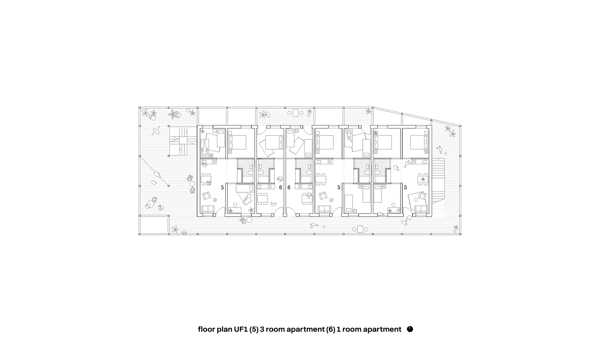 Floor plan drawing showing multiple residential units arranged in a linear configuration