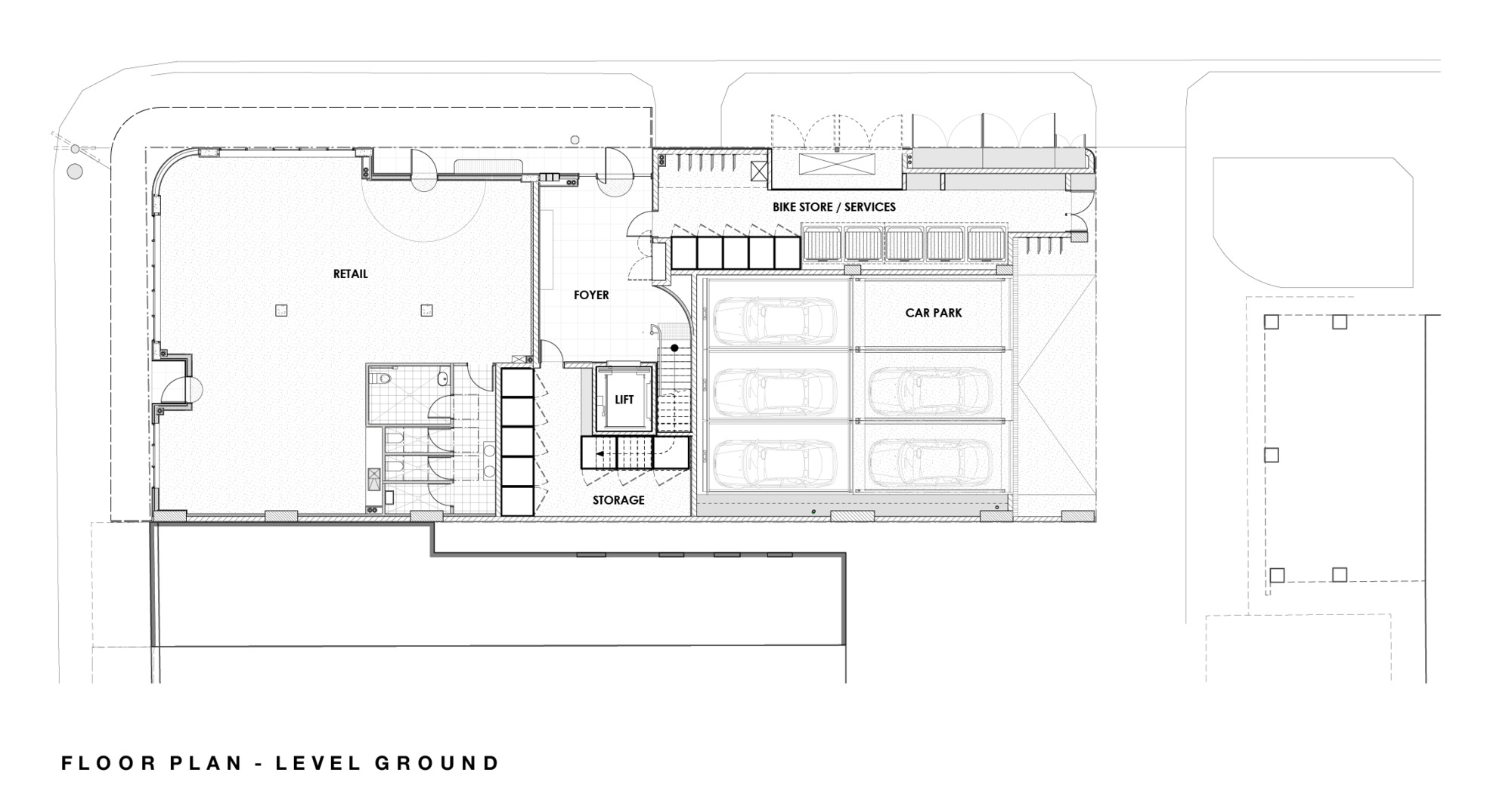 Ground level floor plan drawing showing retail space, car park, bike storage and central lift core